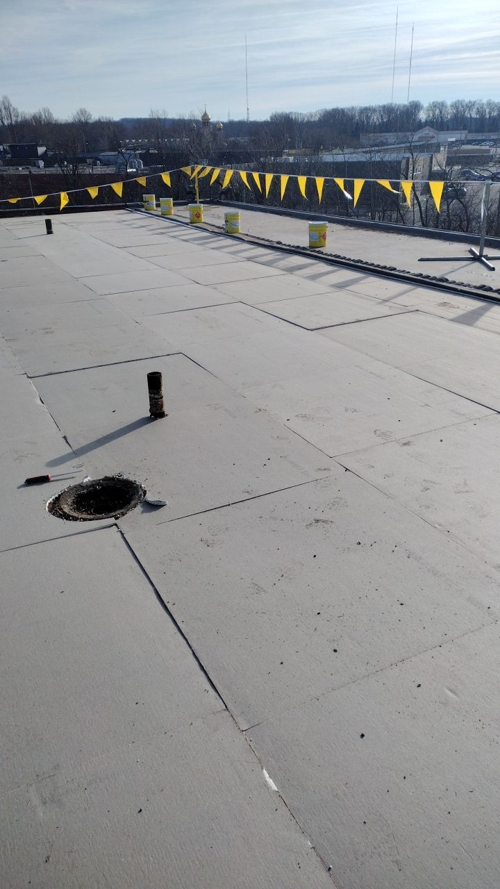 Commercial flat roof parma by Absolute Roofing and Construction