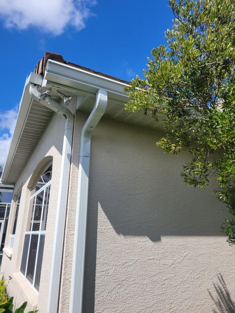 6-inch Seamless Gutter Installation with Splash Guard in University Park, FL by Gutter Professors