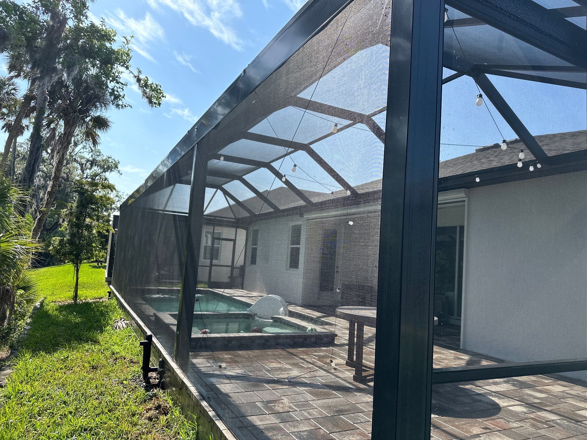 Screen Enclosure & Paver Pool Deck Cleaning in Trevesta Community, Palmetto, FL | Sunshine AquaWash by Sunshine AquaWash