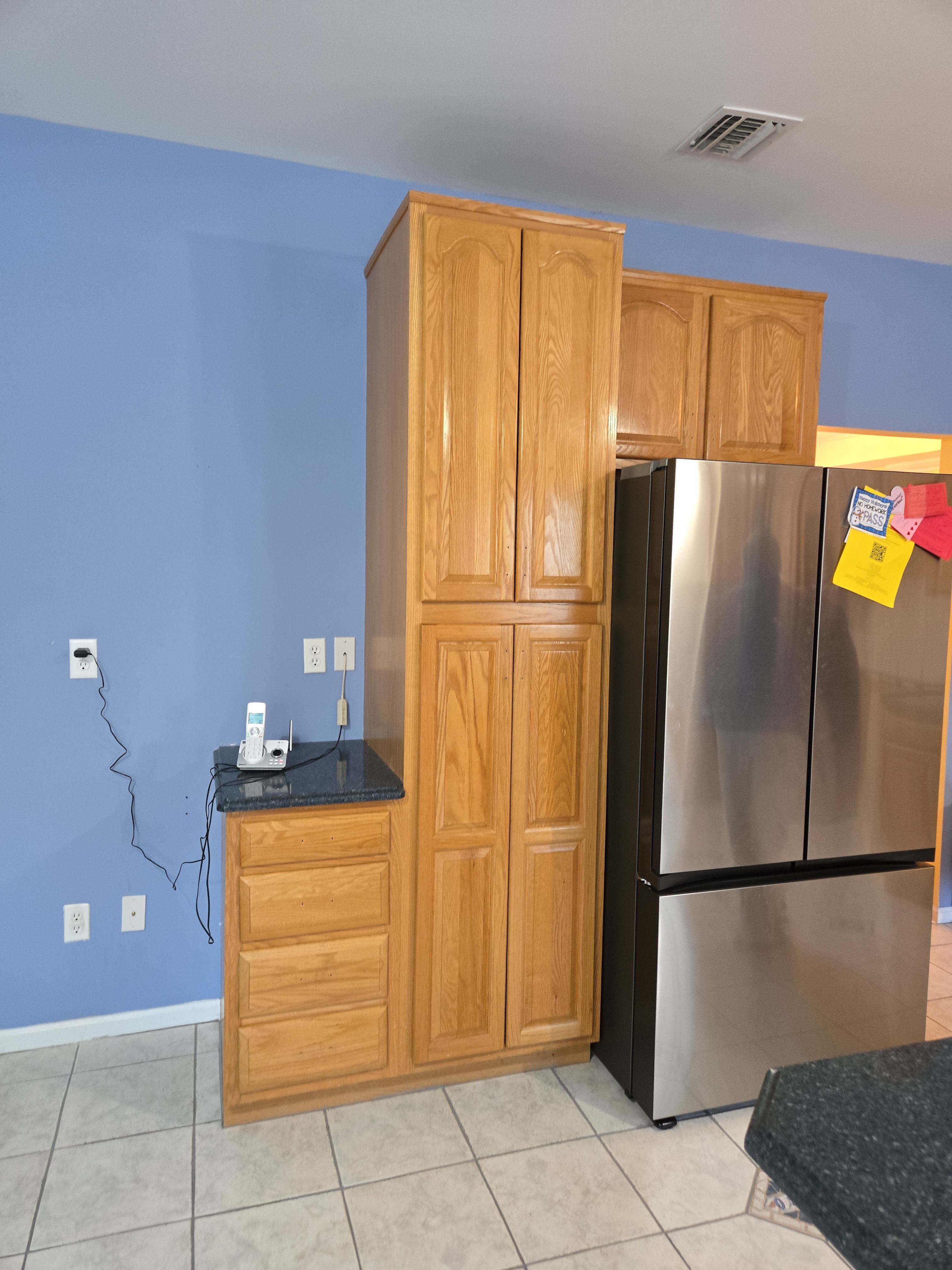 Cabinet Refinishing using Benjamin Moore Command by Spectrum Painting, LLC