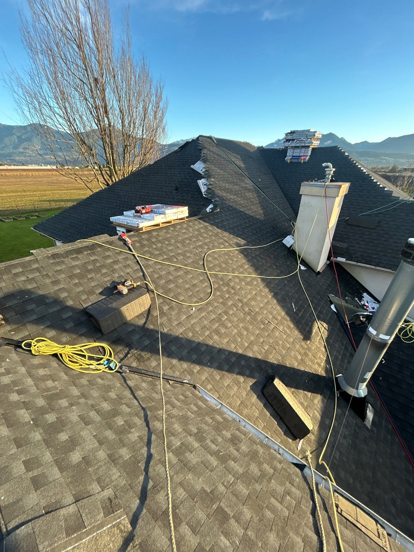 Residential Re-Roof using GAF timberline HDZ Charcoal by Top Notch Roofing Inc