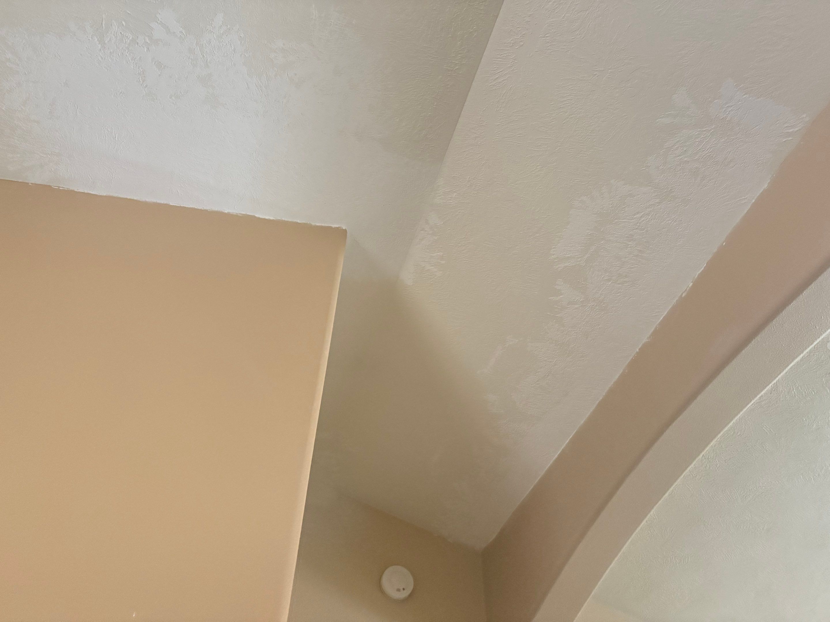Interior Painting and Vaulted Ceiling Drywall Tape Repair in Sioux Falls by Select Painting, Coatings & Garage Cabinets