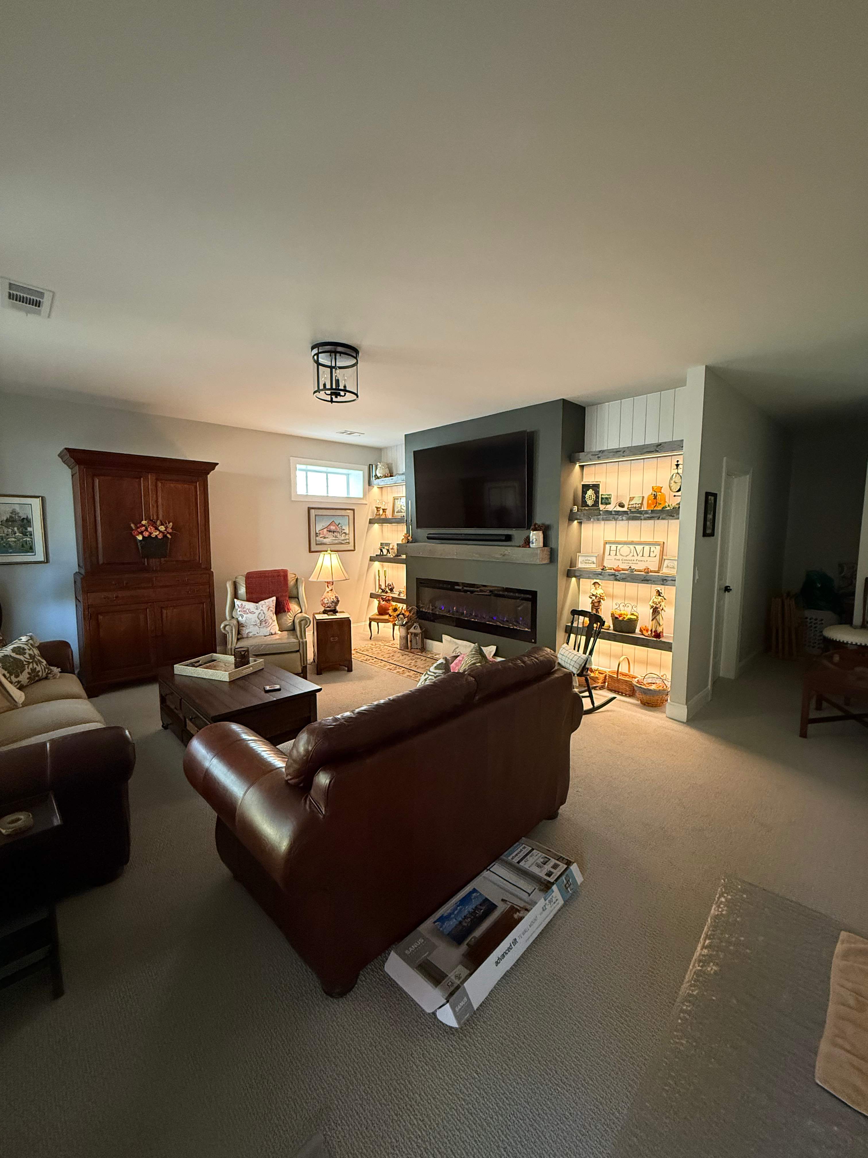 Custom Media Wall and Electric Fireplace Installation in Canton by Swift Home Renovations