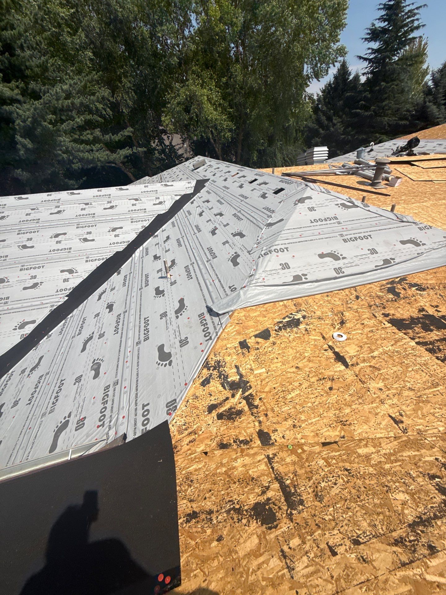 Boise Commercial Roof Replacement with Brown Architectural Shingles by Olive Roofing