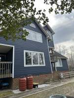 Siding Installation using JH Plank Select Cedarmill Eased edge by ExteriorPros