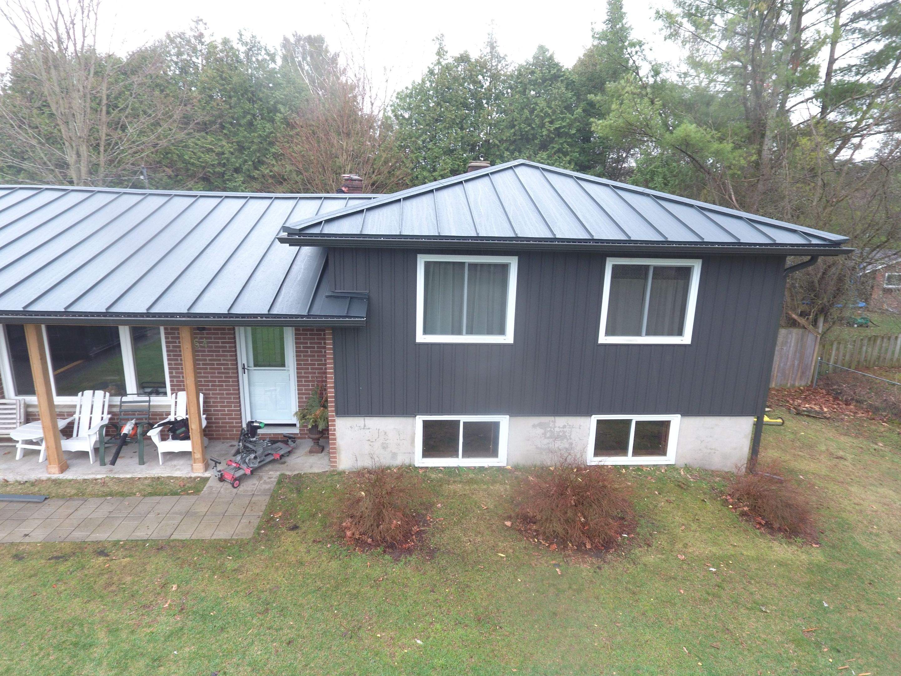Residential Roofing Installation using 24 Ga Standing Seam Metal by Jay Carter Roofing & Sheet Metal