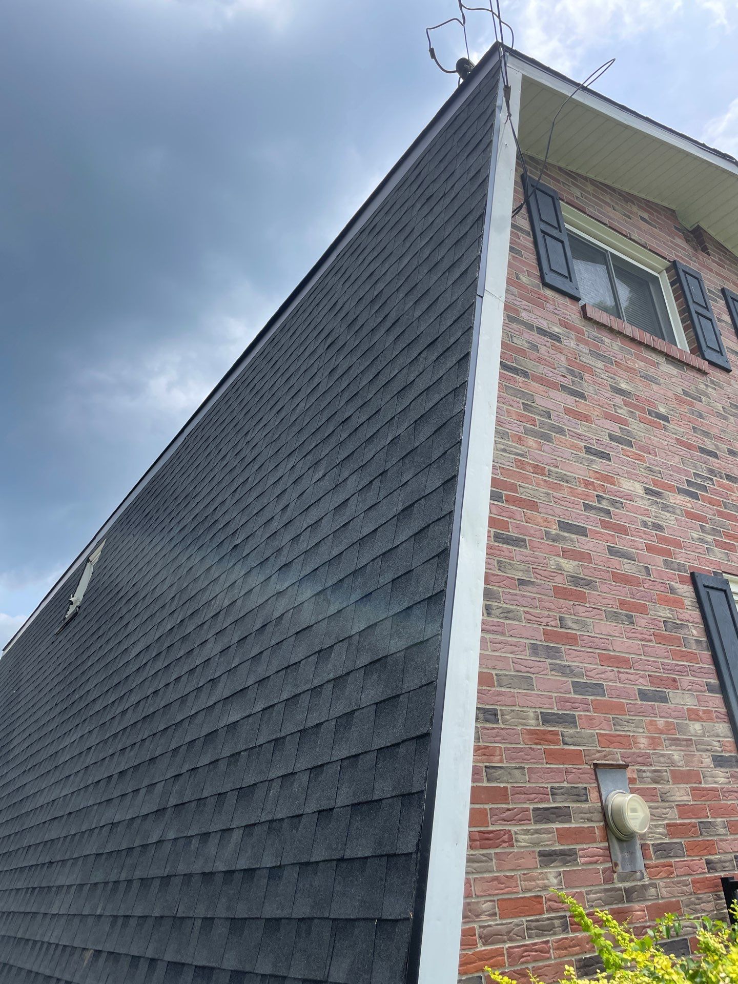 Residential Roofing Installation using GAF Timberline HDZ Charcoal by Rainstoppers Roofing