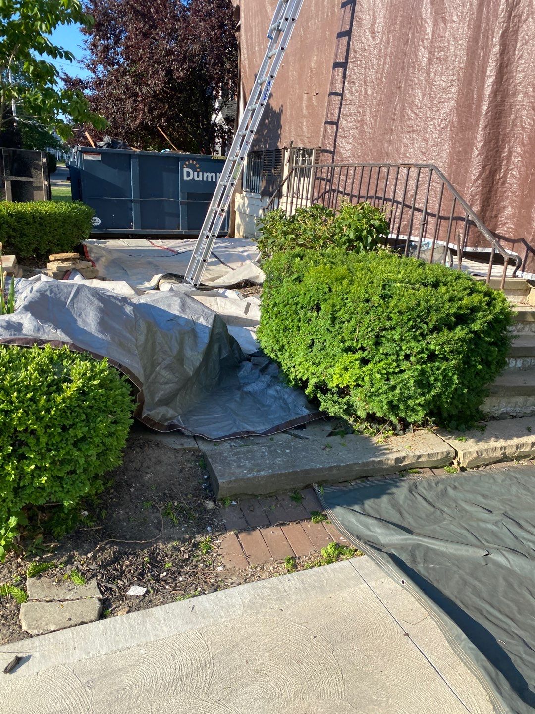 Residential Roofing Installation, Dec-tek walk-out porch roof, siding on garage by Absolute Roofing and Construction