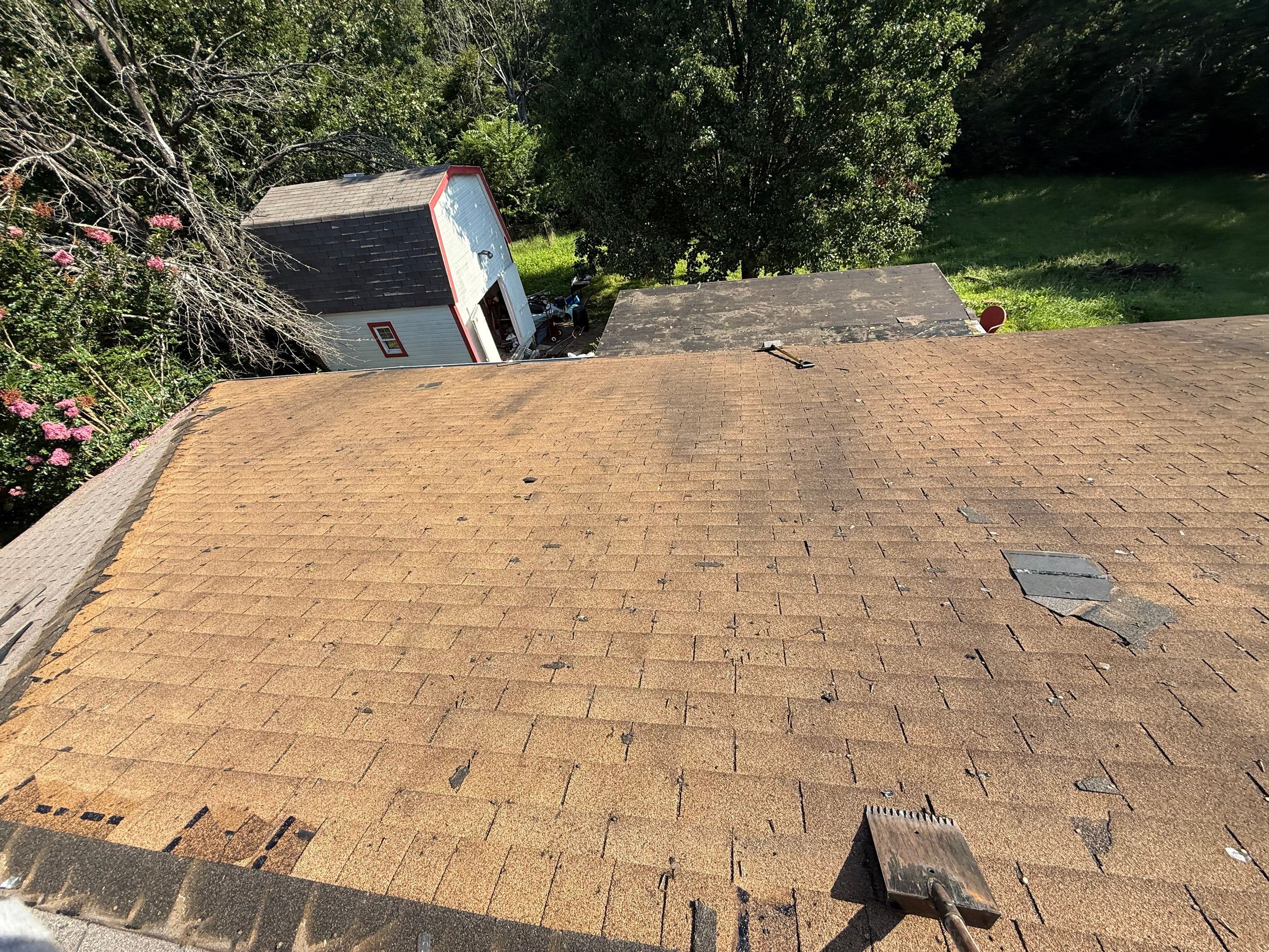 2 layers tear off & installation of new architectural shingles. by In & Out Construction & Remodeling, LLC