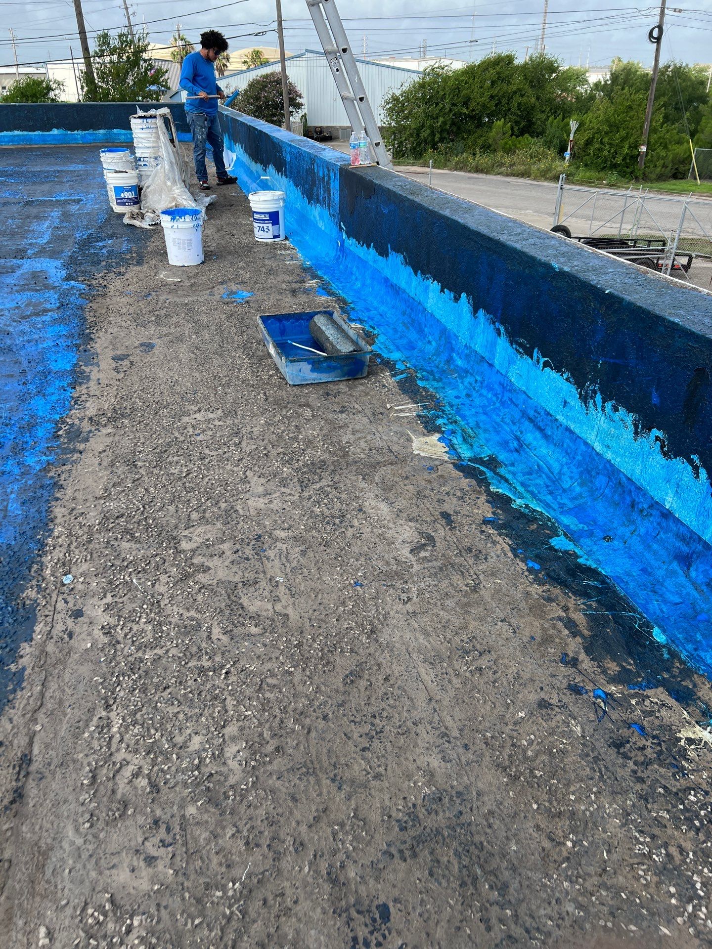 Dirty leaking Gravel Roof by Bayfront Roofing and Construction