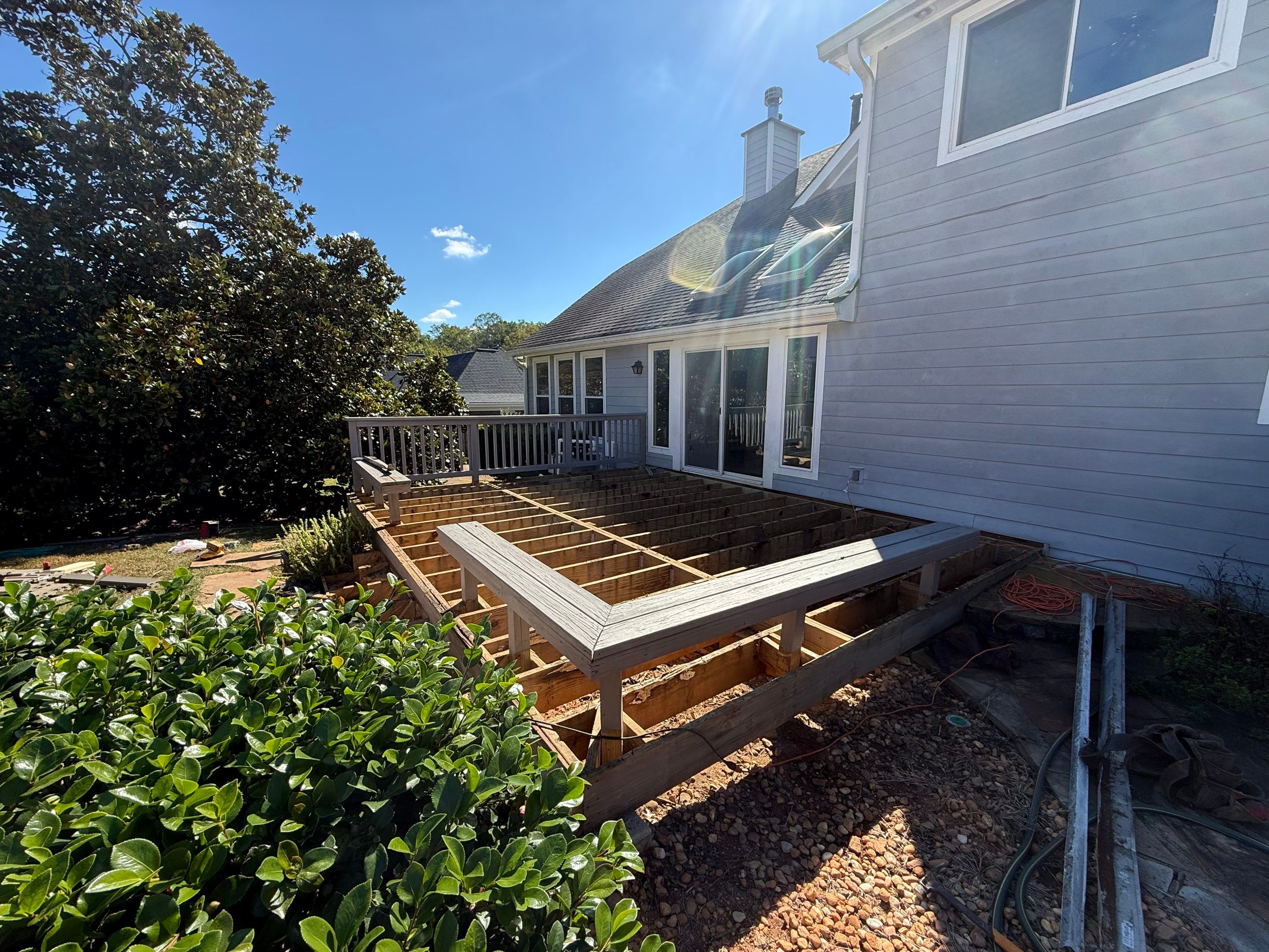 Custom Composite Deck with Integrated Seating in Roswell by Swift Home Renovations