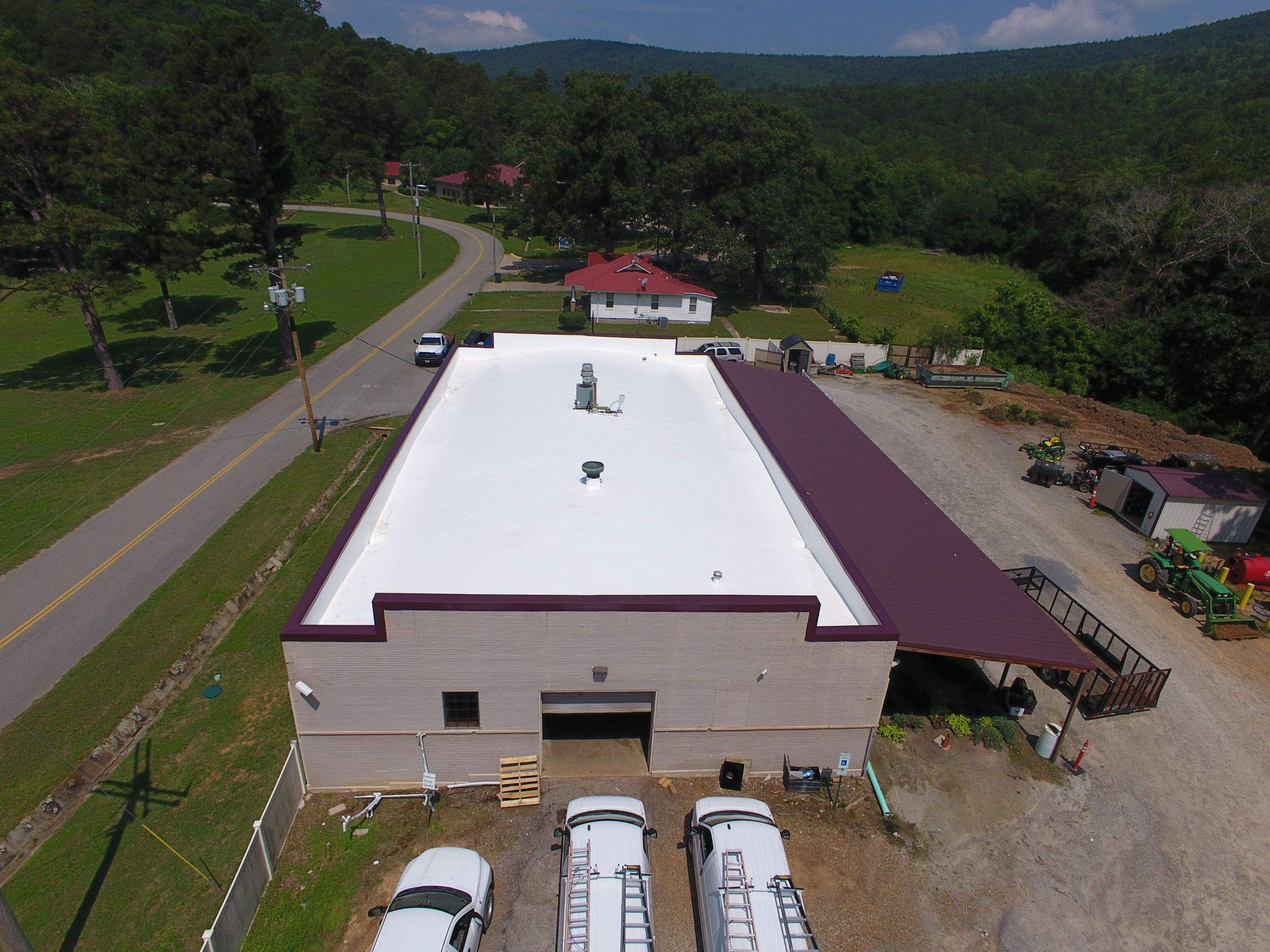 Choctaw Nation Healthcare Center - White Building by Hostetler Roofing