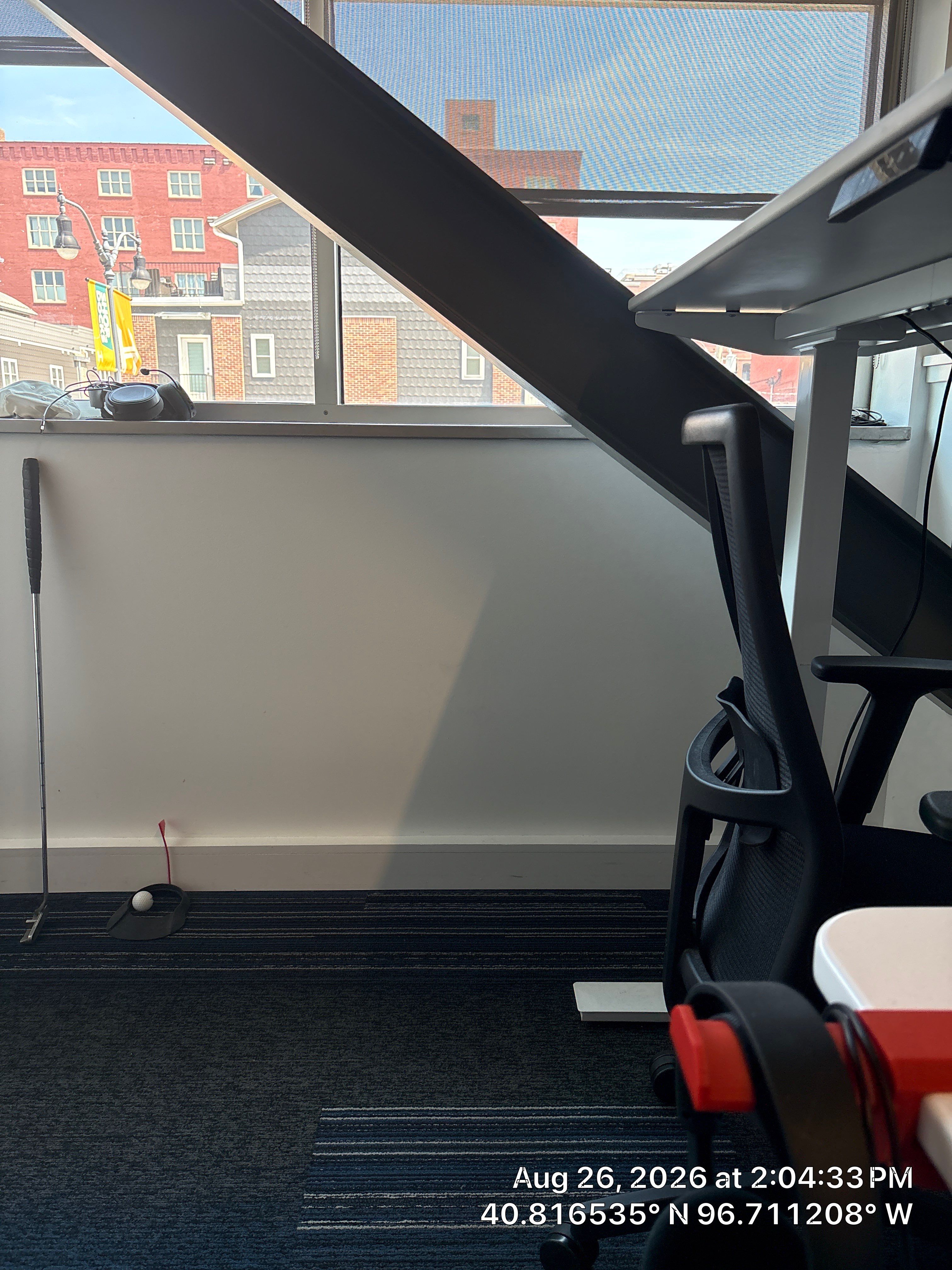 Modern Lincoln Office Setup with Integrated Indoor Putting Area by CompanyCam Sales Demo