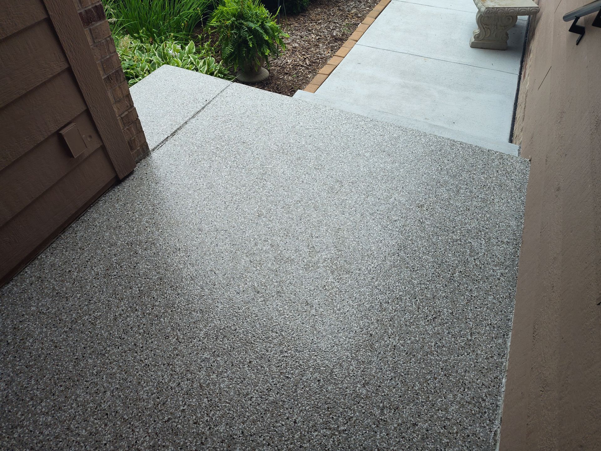 Slip Resistant, Durable, and Aesthetically-Pleasing Front Porch in Omaha  by Revival Concrete Coatings