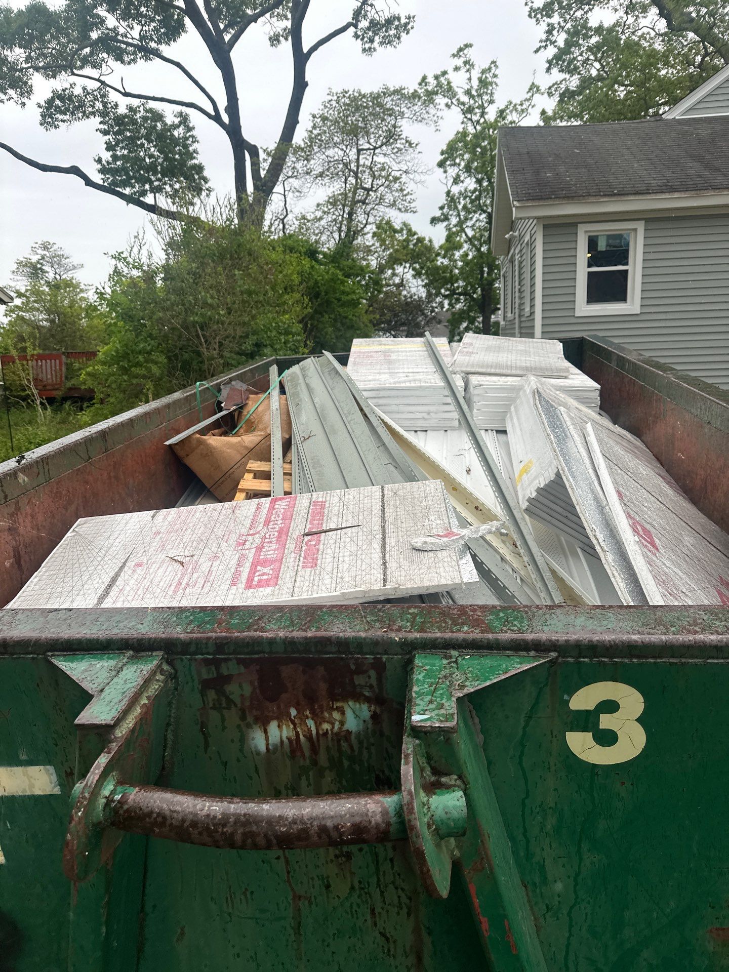 Milford Exterior Renovation Featuring Custom Siding and Wood Deck Installation by A Plus Exterior