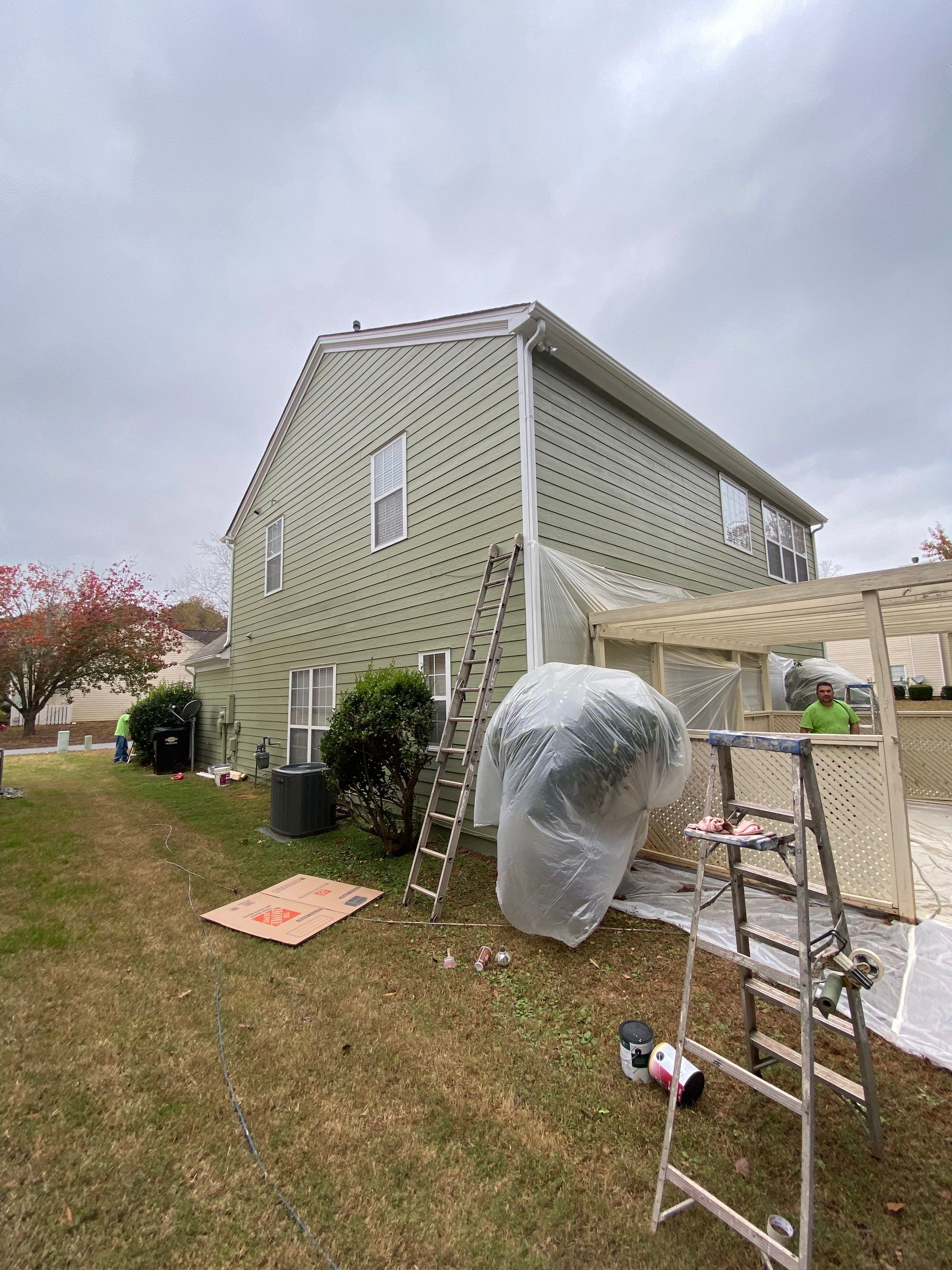 Exterior Painting for a Two-Story Sage Green Home in Kennesaw by Swift Home Renovations