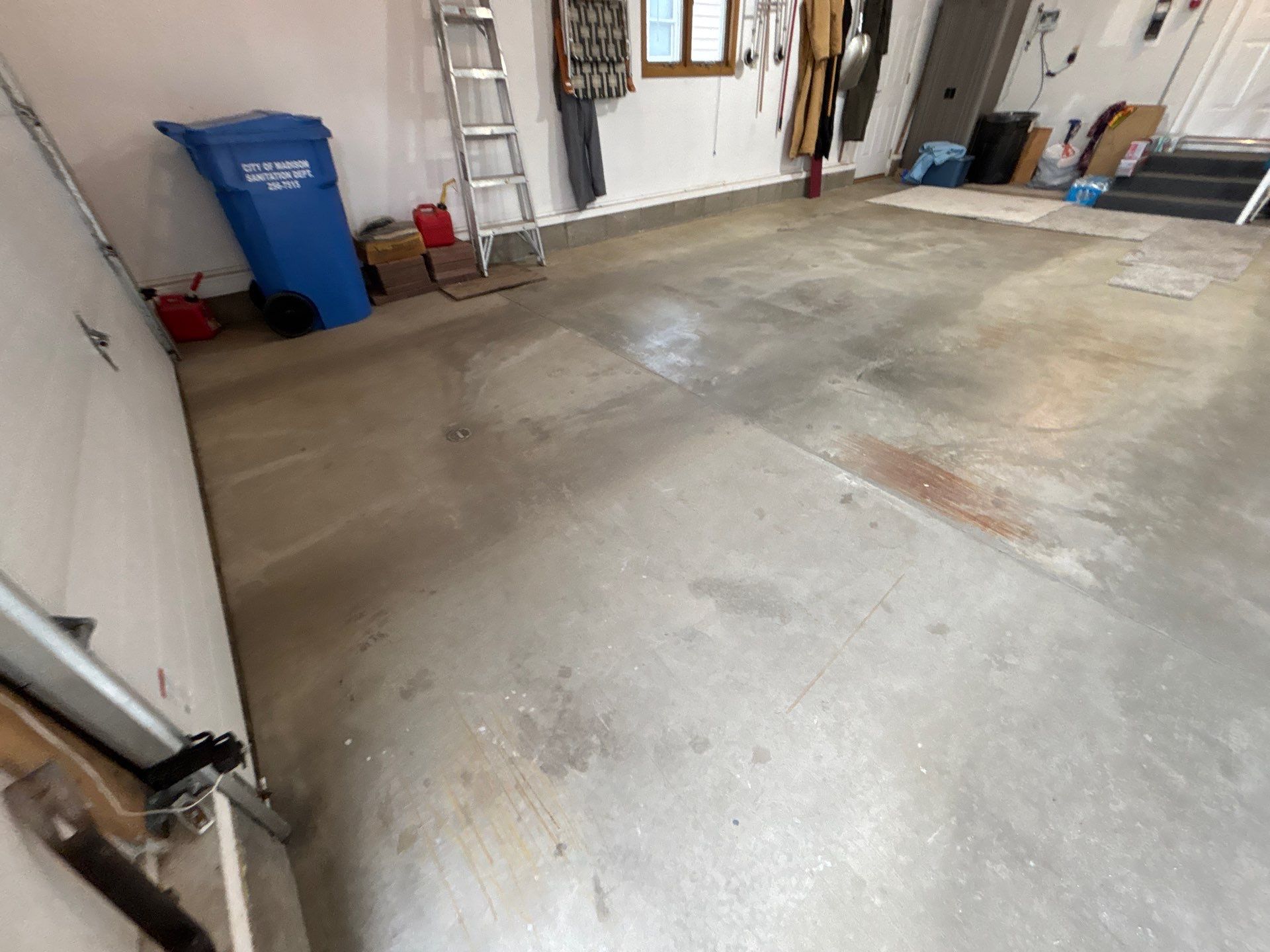 Madison Garage Concrete Coating with Feather Grey Speckle Finish by Select Painting, Coatings & Garage Cabinets