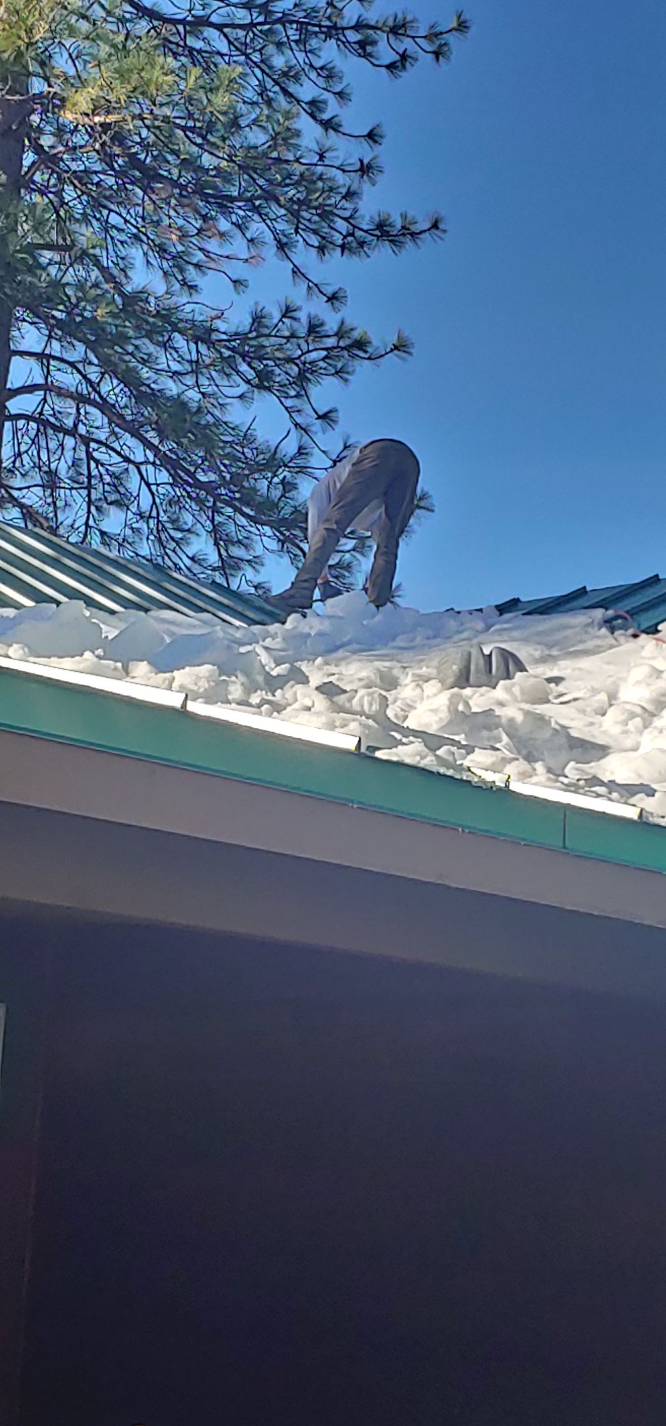 Metal roofing installation using Standing seam metal roofing system by Straight Edge Roofing Inc