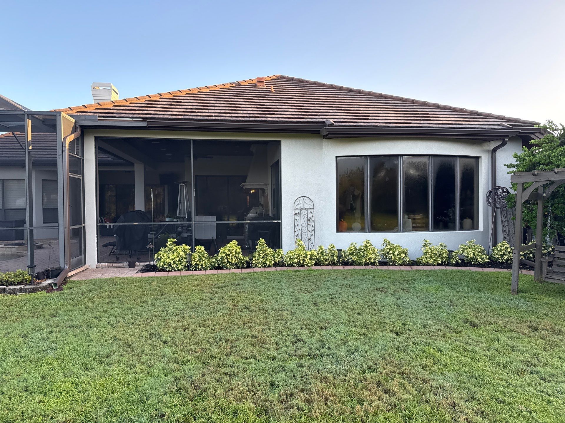 Tile Roof, Paver Pool Deck & Flowerbed Curbing Cleaning | Winding River Bradenton, FL Transformation by Sunshine AquaWash