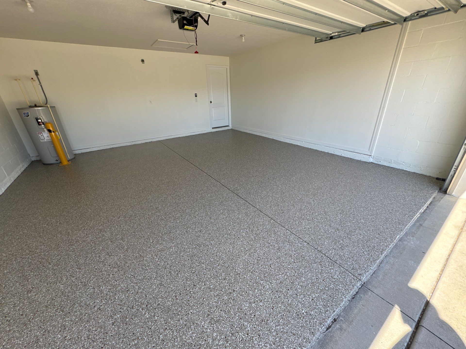 Clean & Practical 'Creekbed' Flake Finish by Performance Floors & Coating