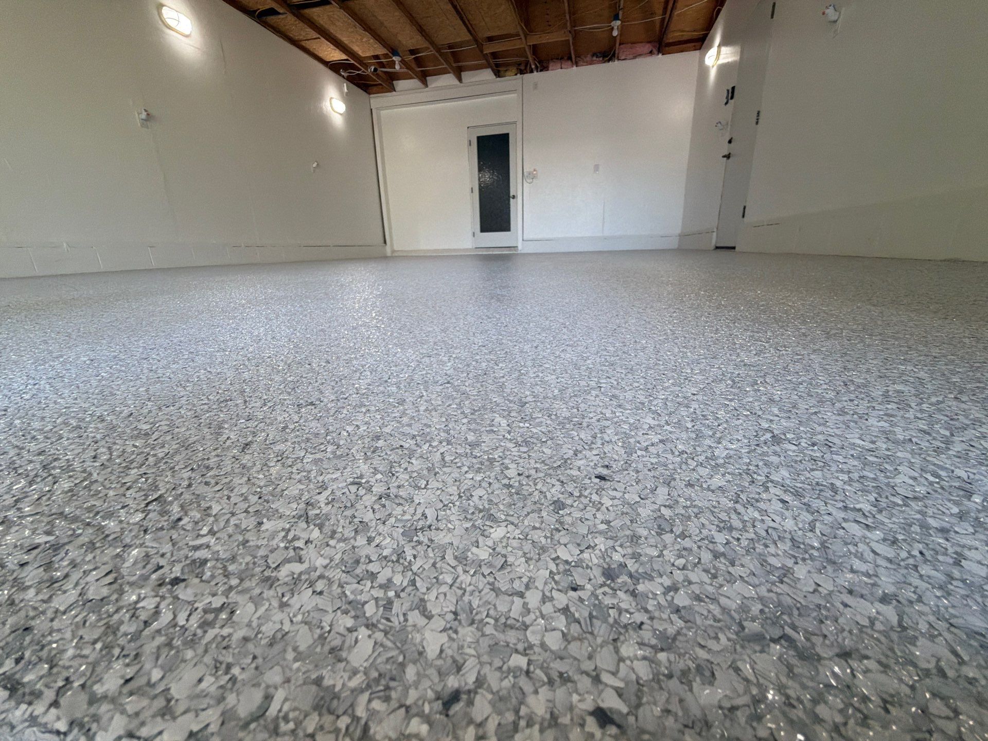 Custom Epoxy Flake Garage Floor Installation in Muskegon by Gordon Painting