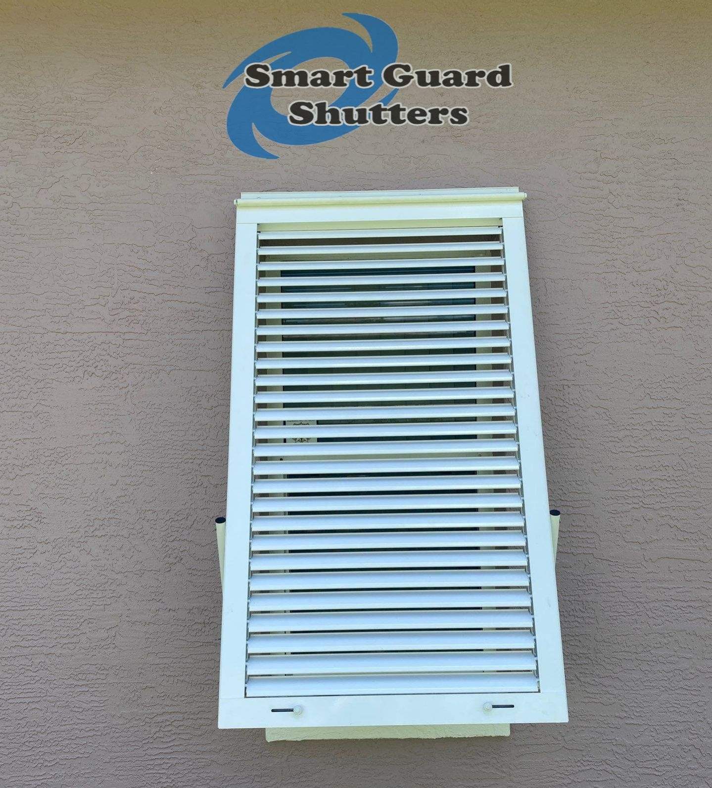 Impact Bahama Shutters in Signal White by Smart Guard Shutters