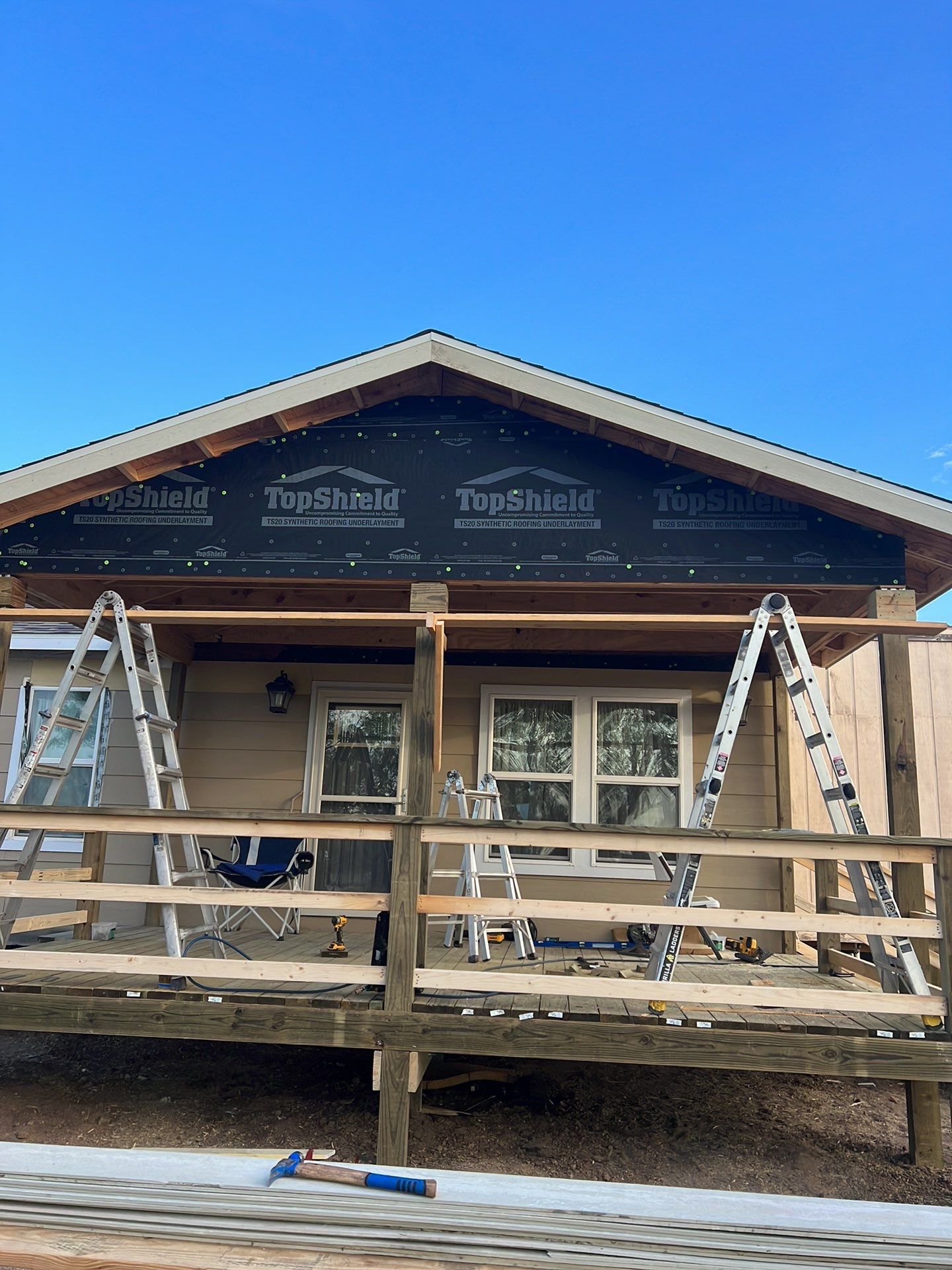 Front Porch Sitt'n by Bayfront Roofing and Construction
