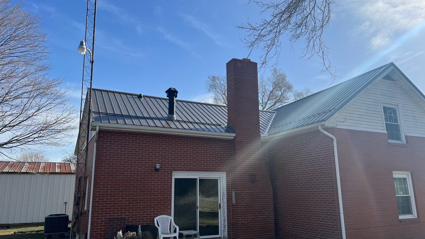 Residential Roofing Installation using Performance Panel Metal - Burnished Slate by RoofX 
