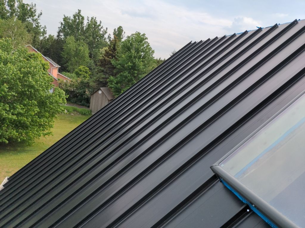 Residential Roofing Installation using 24 Ga Standing Seam Metal  by Jay Carter Roofing & Sheet Metal