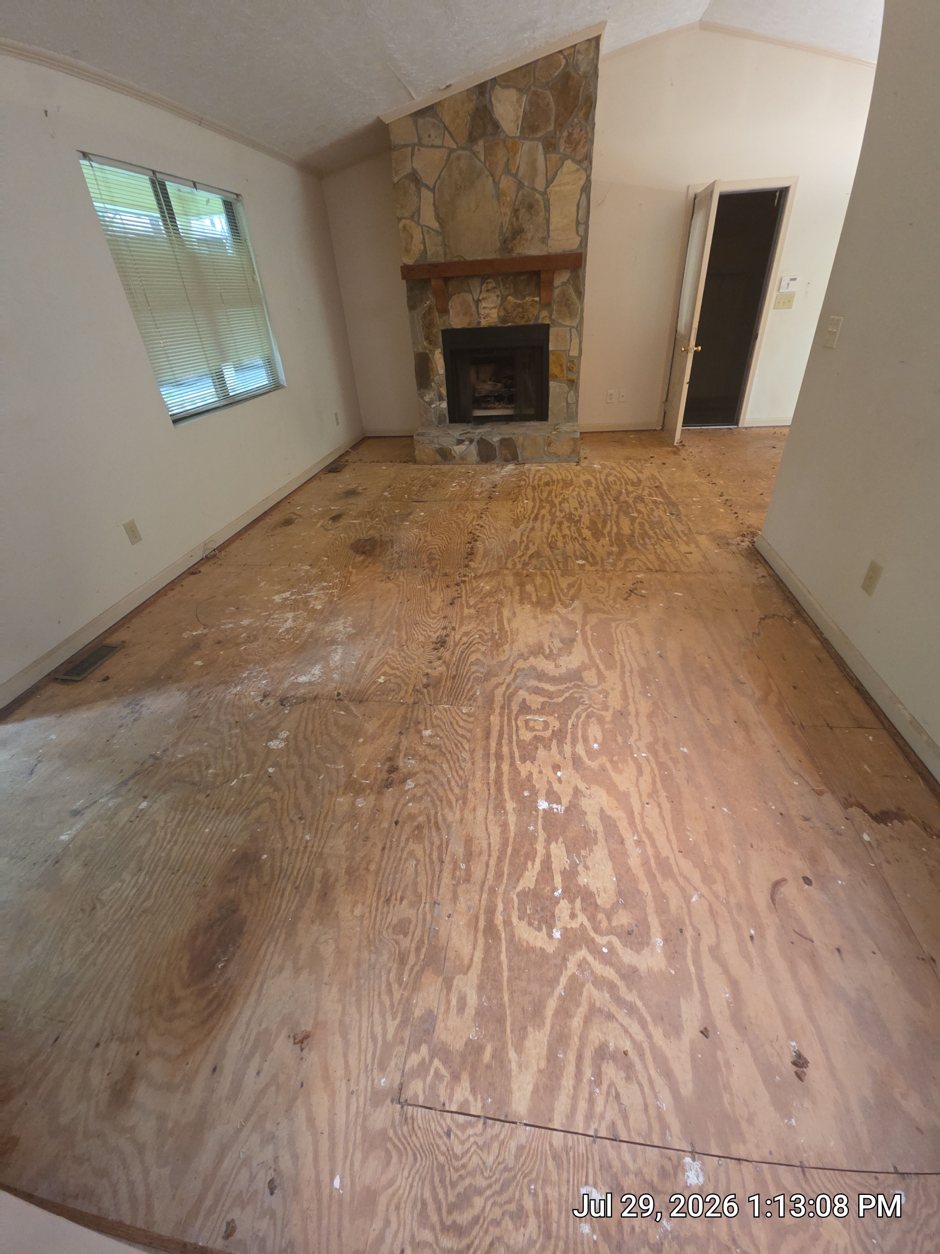 Full Home Subfloor Restoration and Luxury Vinyl Flooring Installation by Flooring Xpress CO