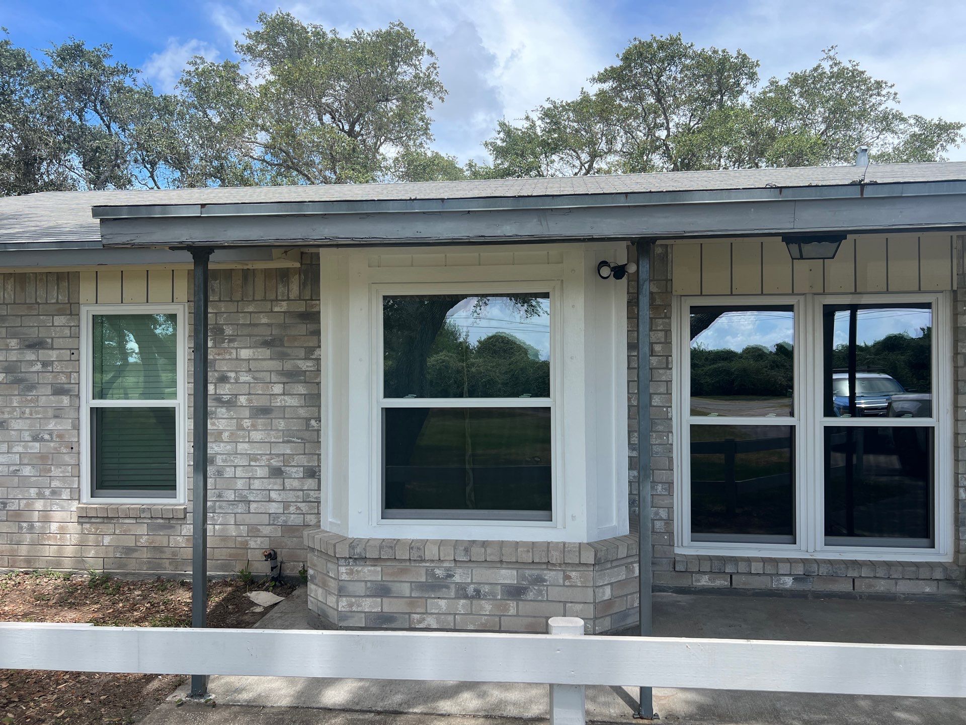 Installing Windows on a Submarine  by Bayfront Roofing and Construction