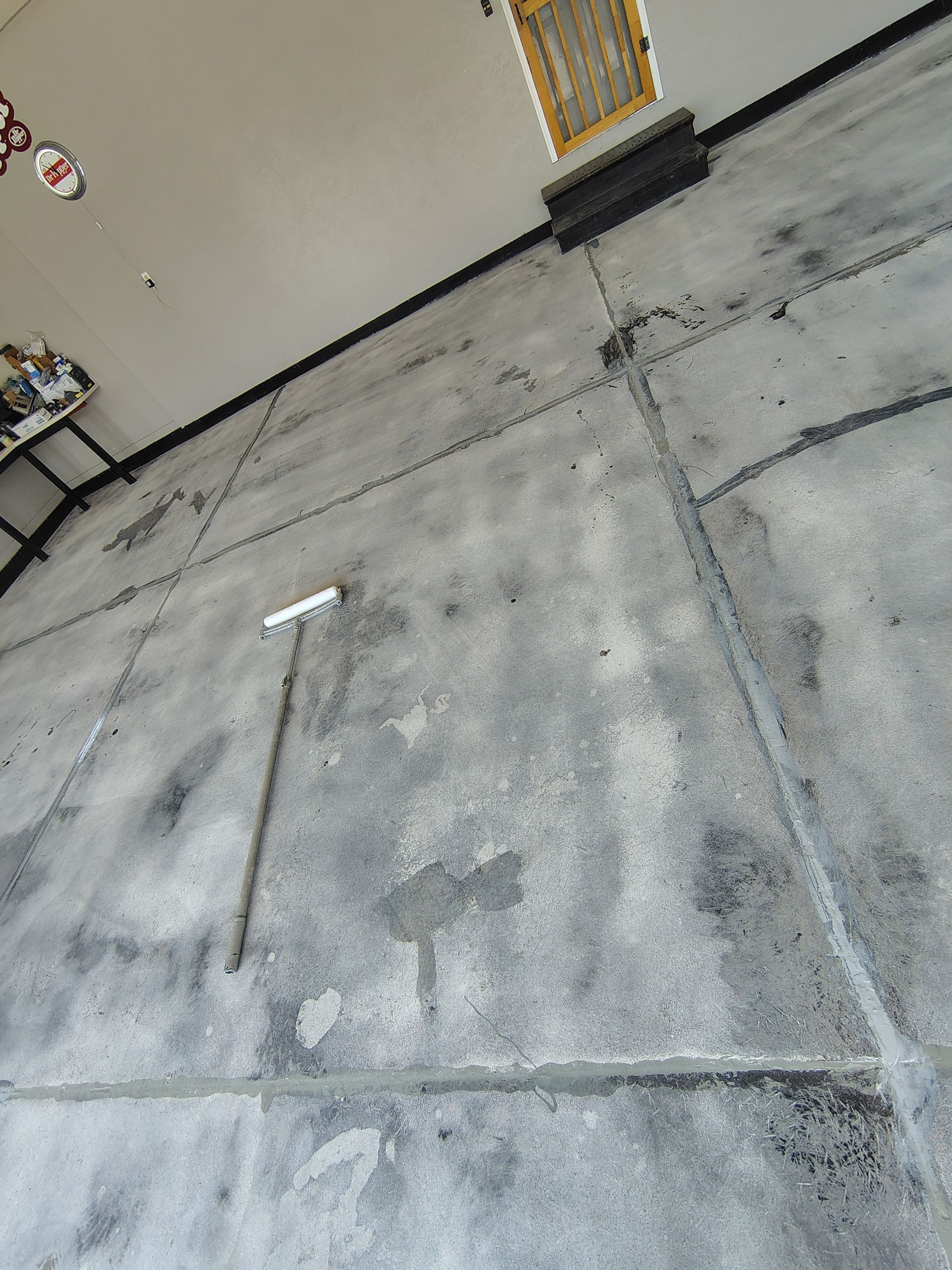 Garage Concrete Floor Coating and Crack Repair in Onawa by Select Painting, Coatings & Garage Cabinets