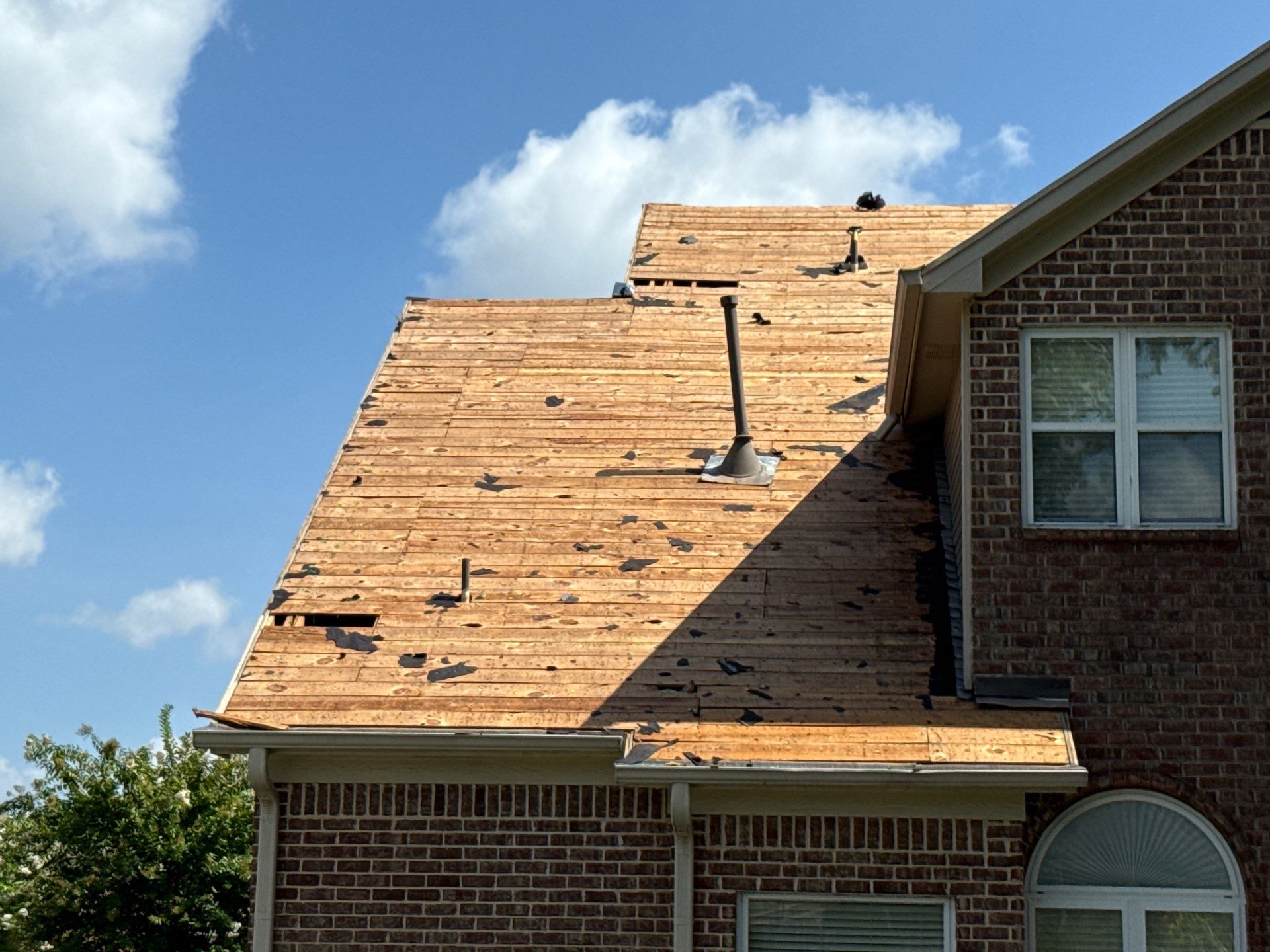 Full Residential Roof Replacement for Southaven Brick Colonial Home by Revival Roofing Services