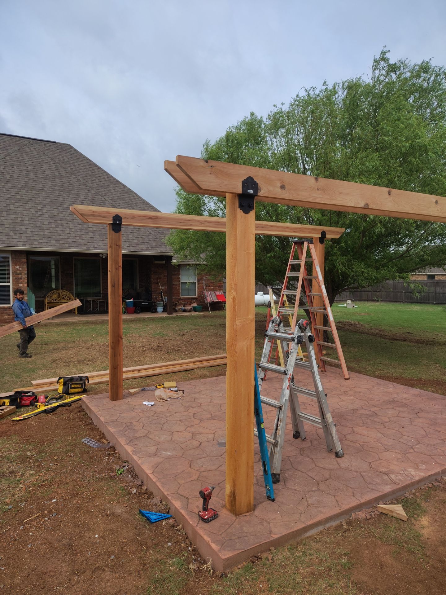 Stamped Concrete & Custom Pergola Build by Clays Services Inc