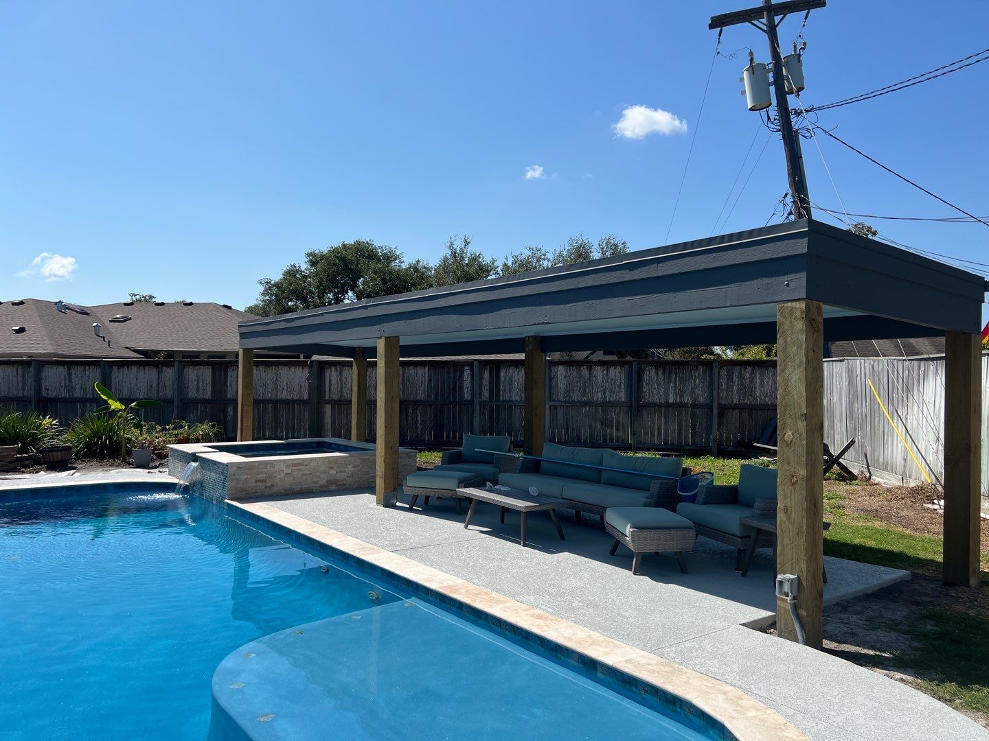 Beautiful pool side build by Bayfront Roofing and Construction