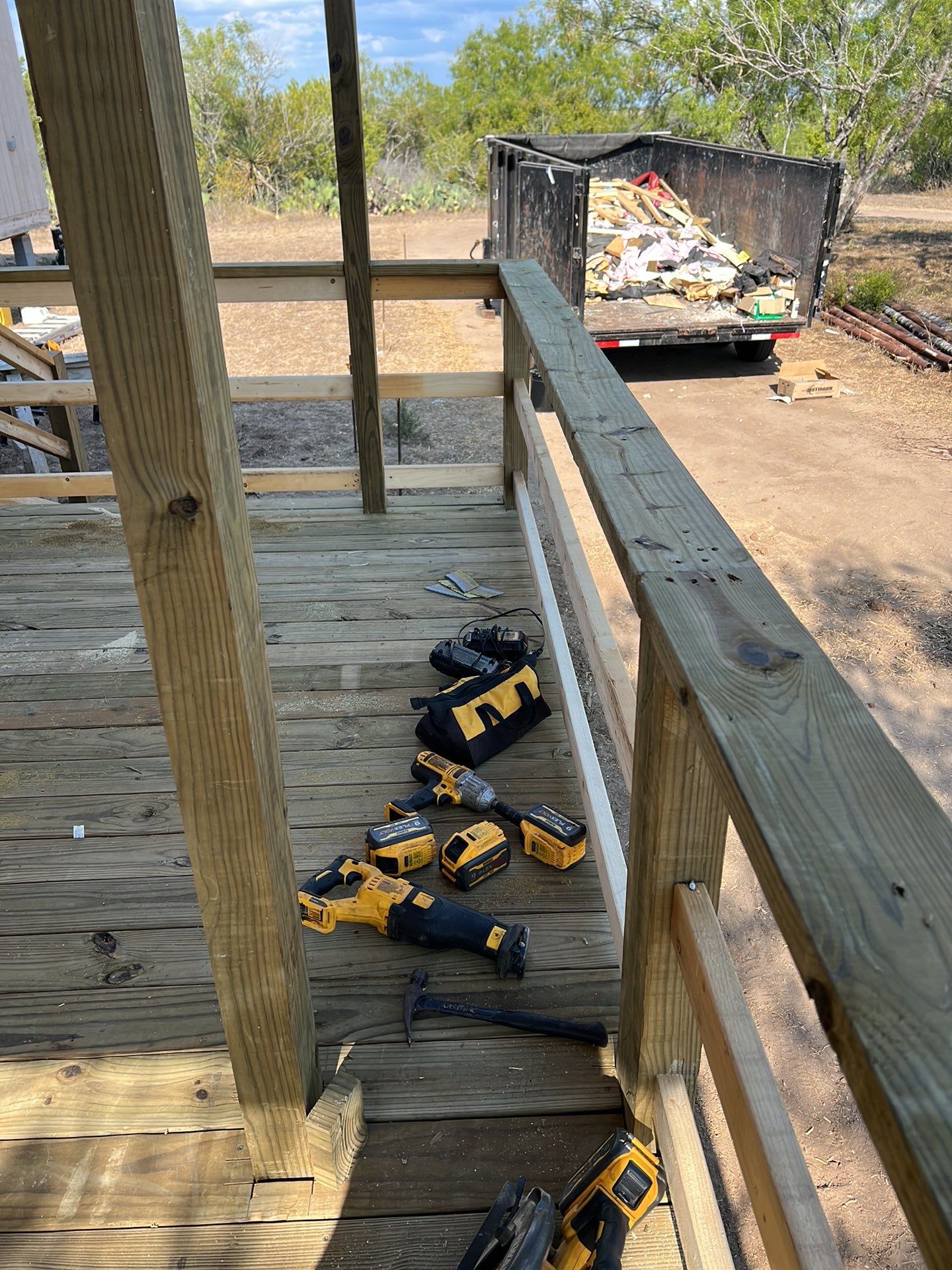 Front Porch Sitt'n by Bayfront Roofing and Construction