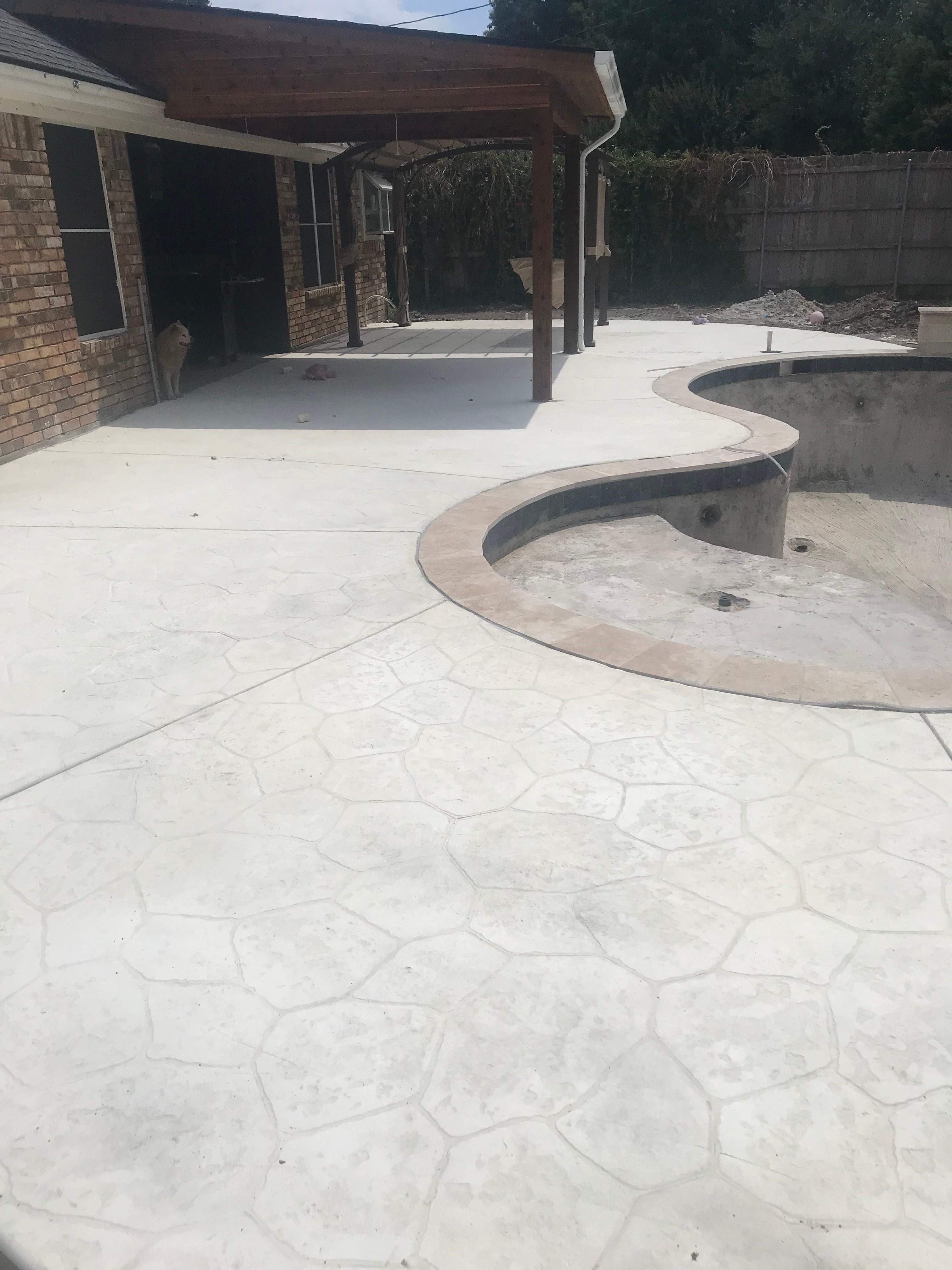 Freeform Pool with Raised Spa and Stone Decking by Pinnacle Pools and Spas - DFW