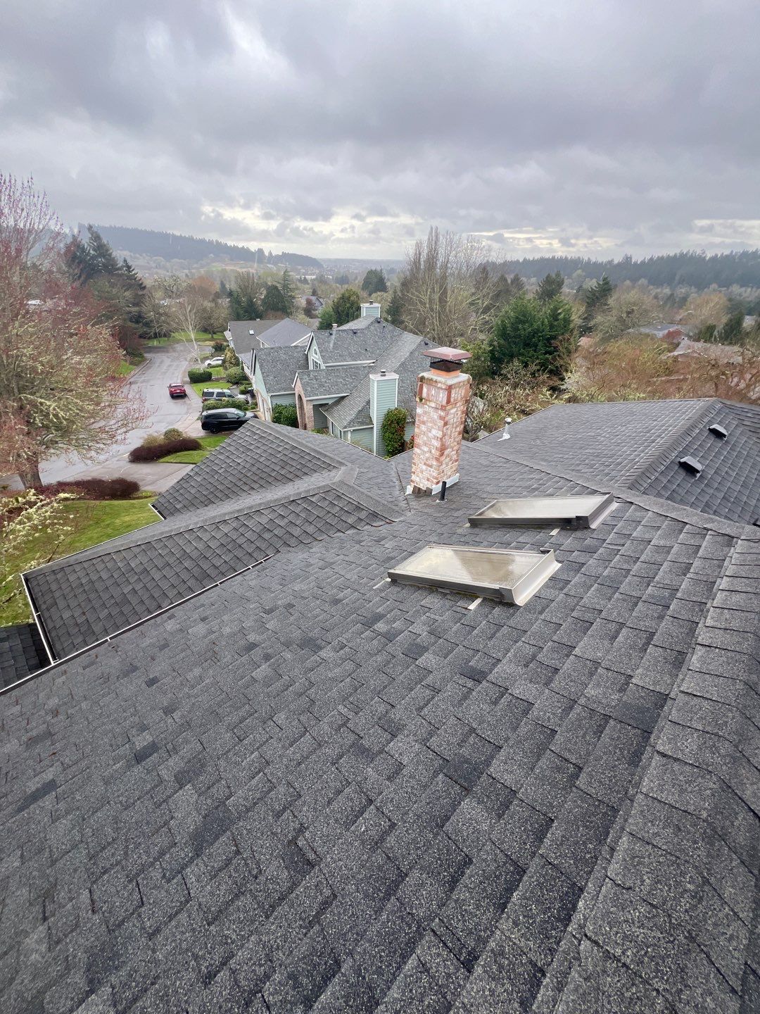 Residential Roofing Installation using IKO Dynasty (Color: Granite Black) by Orezona Building & Roofing Company, Inc.