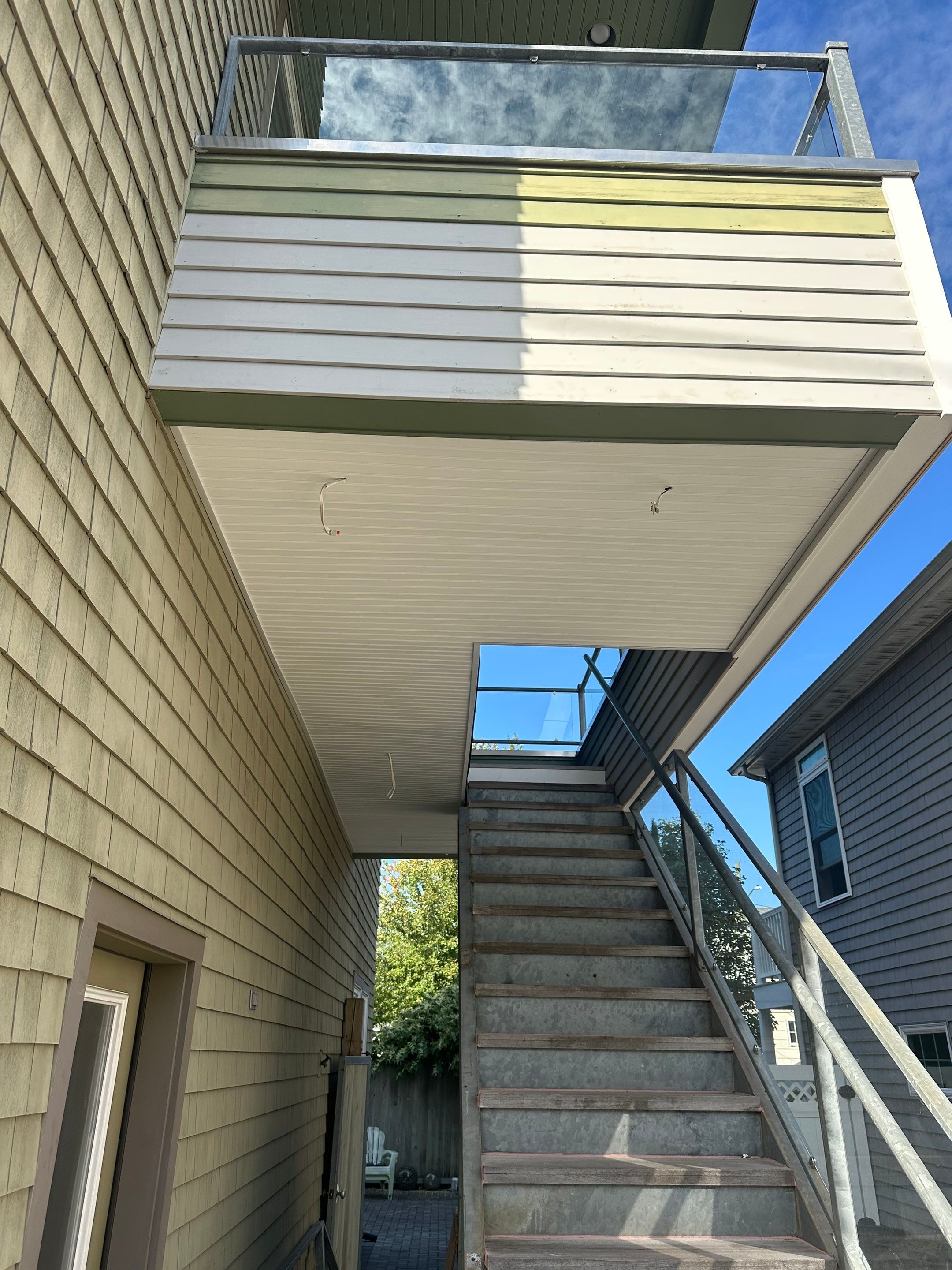 Deck Installation using Tanzite Stone Decking by A Plus Exterior