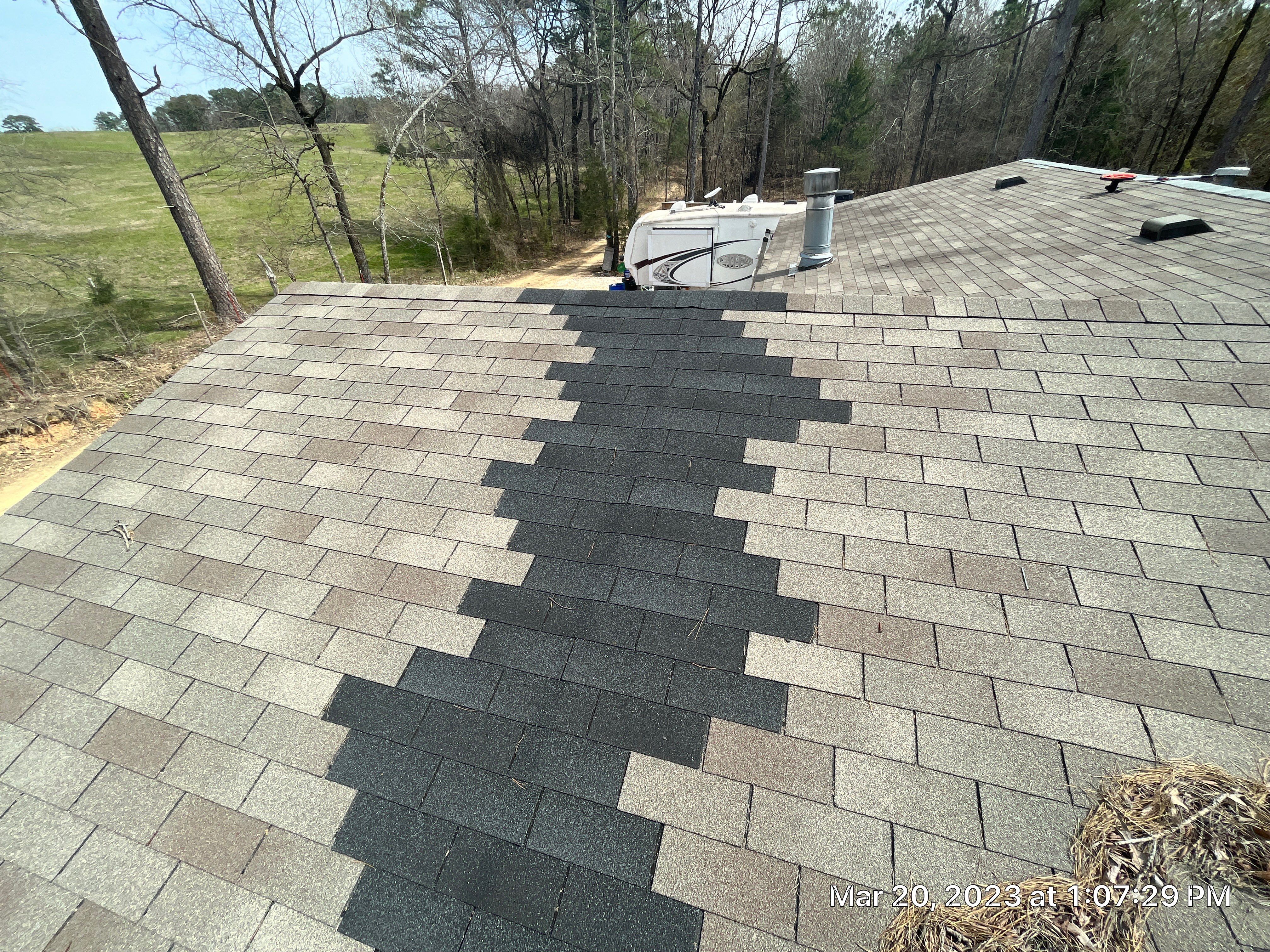 Residential Roofing Installation using 26 Gauge Colored Panels by Hostetler Roofing