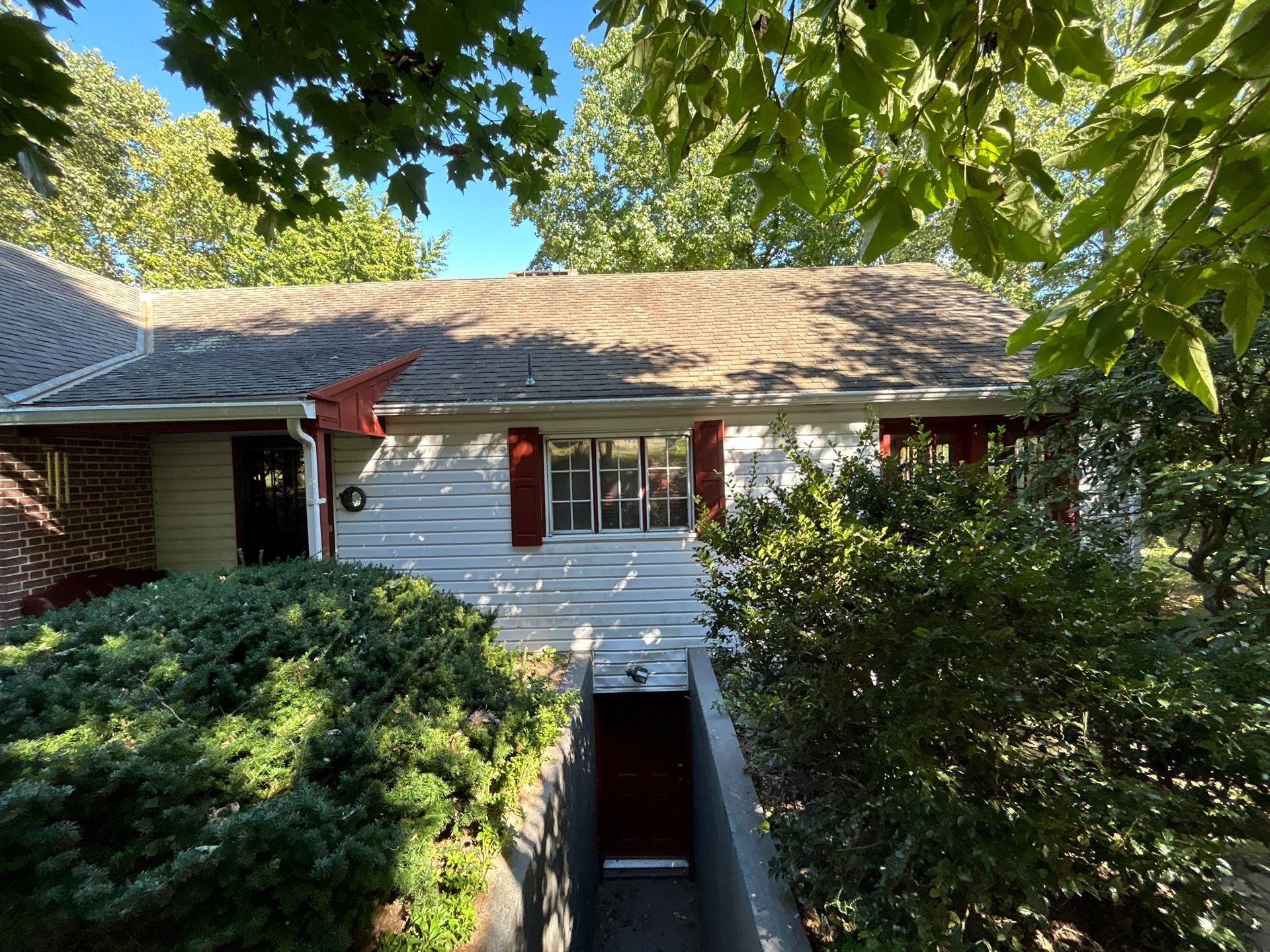 Red Metal Roofing Installation and Trim Restoration in Bernville by Esh Builders