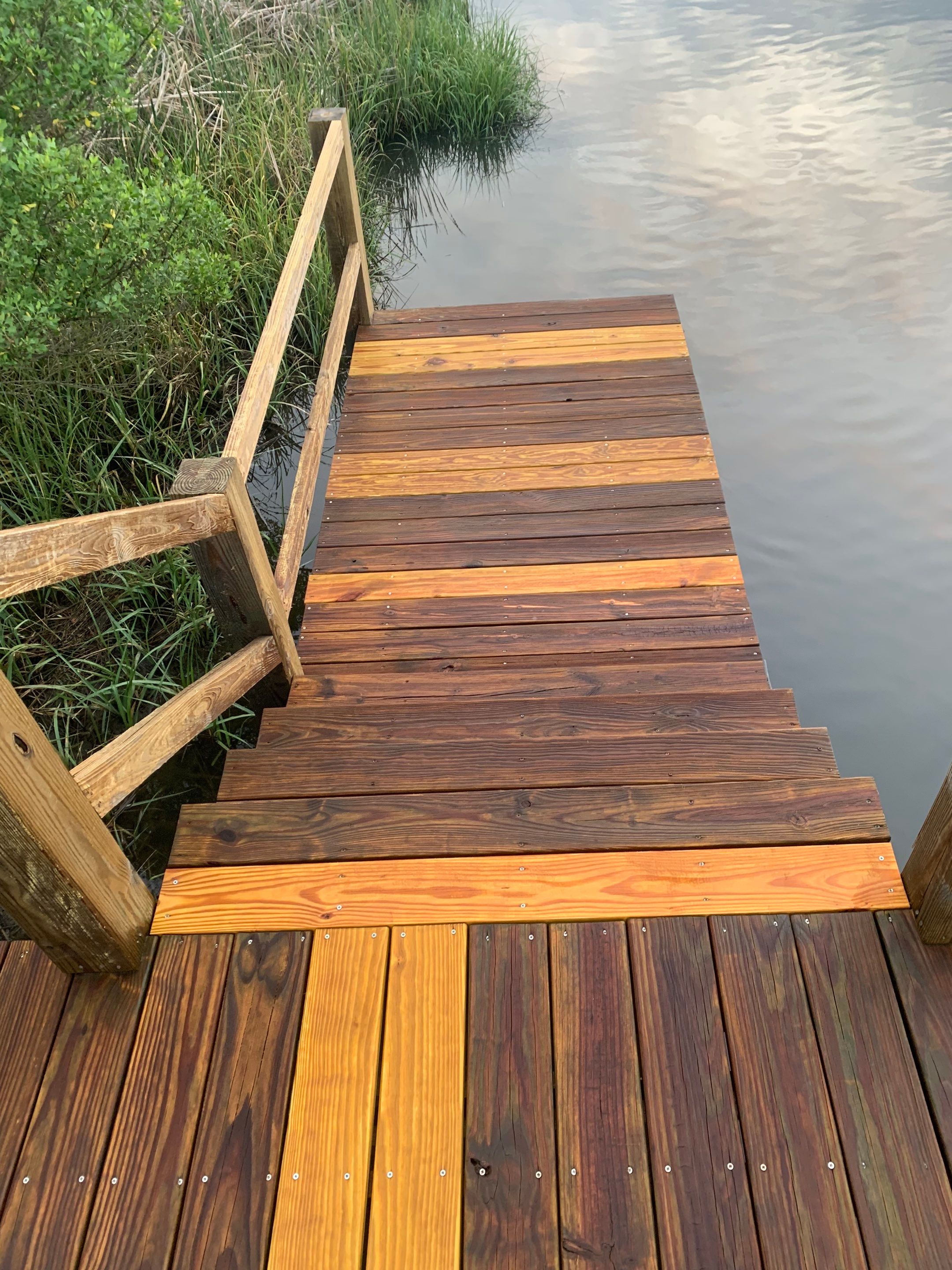 Dock, decks and carport using wood and concrete sealer by DuraSeal