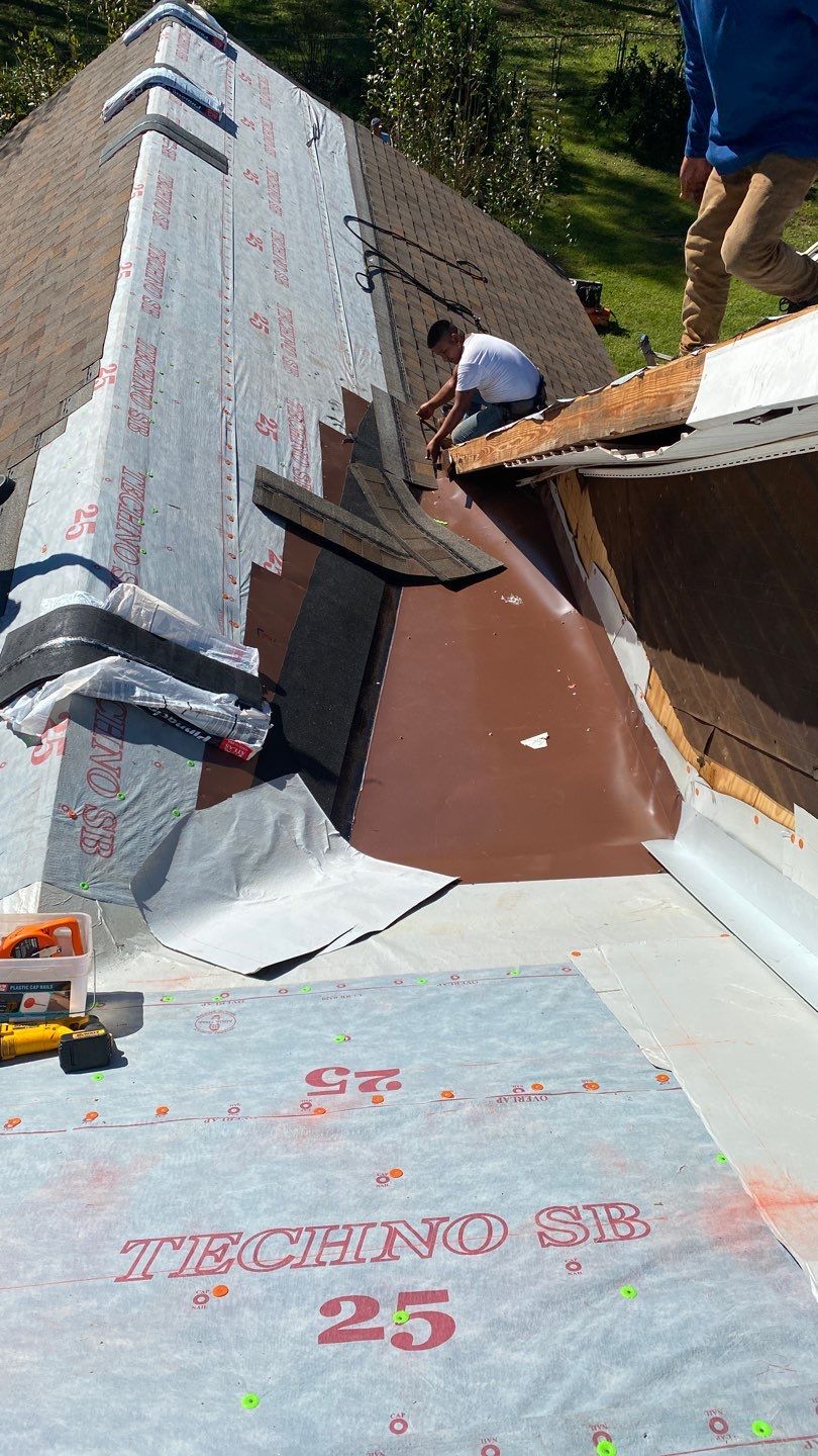 Residential Roofing Installation using Roof Replacement by American Roofing & Construction LLC