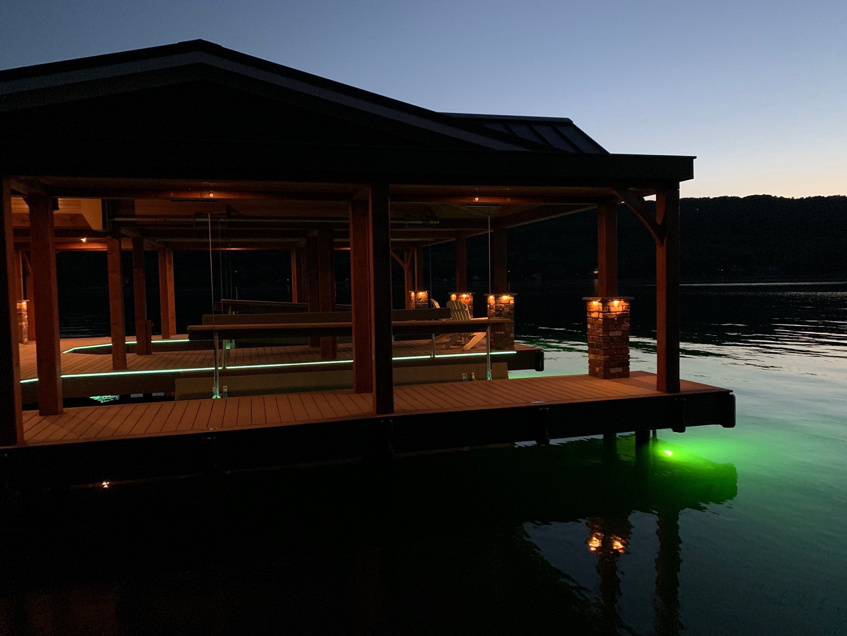 Custom Timber-Framed Boat Dock with Multi-Color LED Lighting on Keuka Lake, New York by Outdoor Lights + Shades