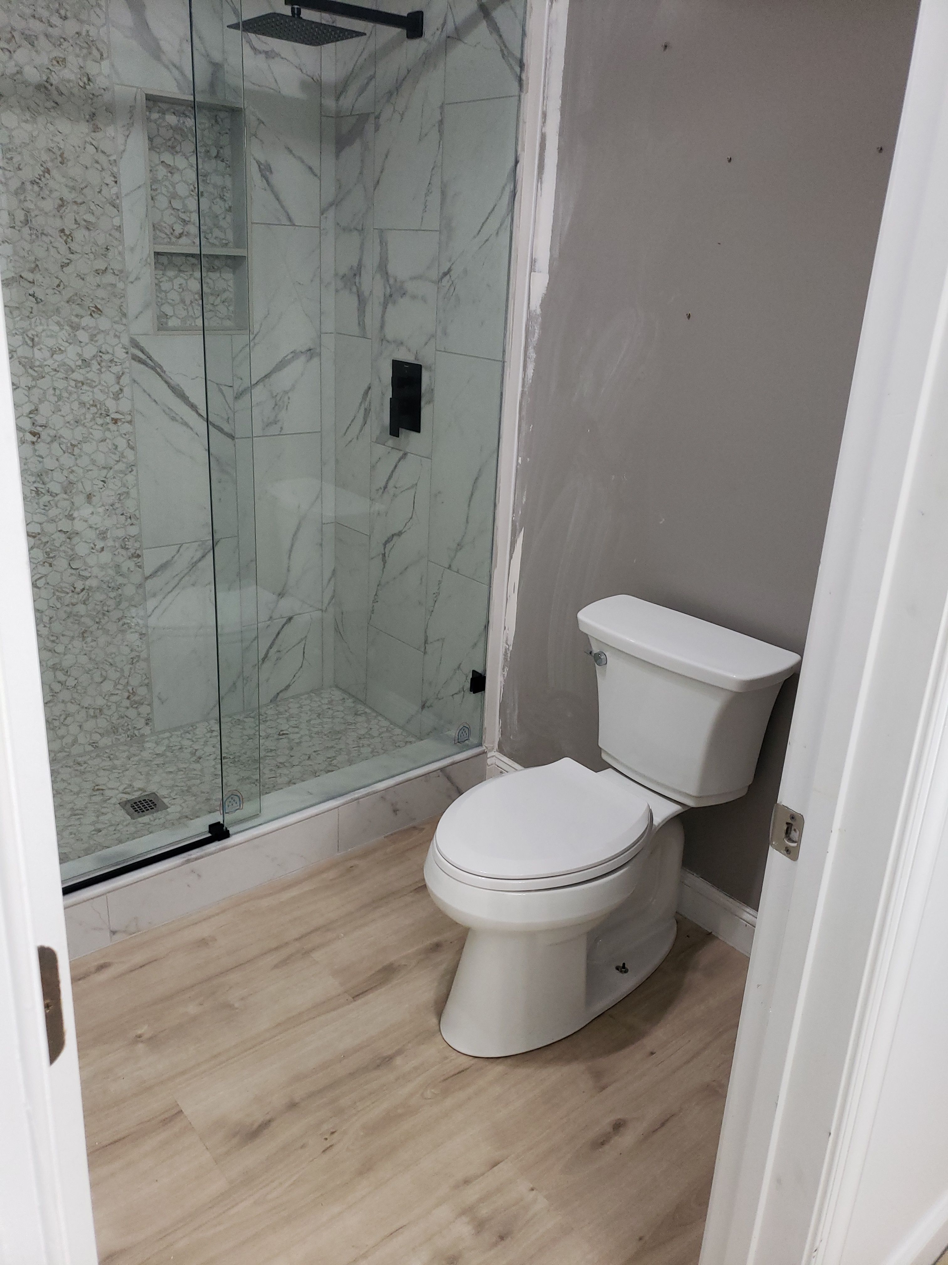Jack & Jill Bathroom Upgrade by A Step Above Handy LLC