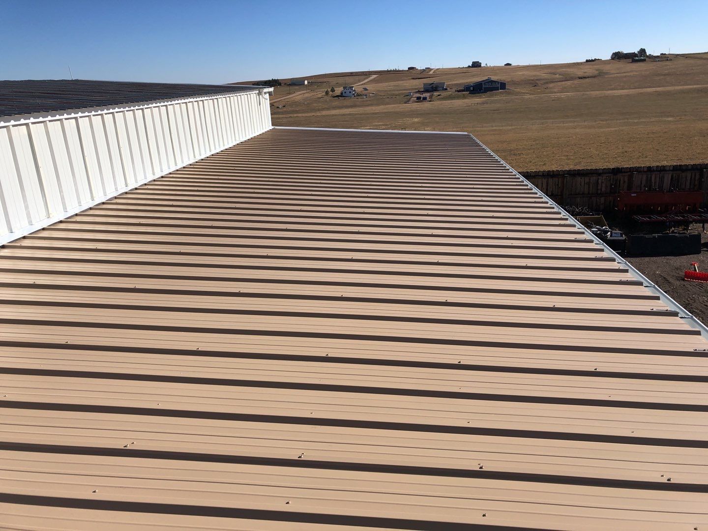 Residential Roofing Installation using Metal roofing by American Roofing & Construction LLC