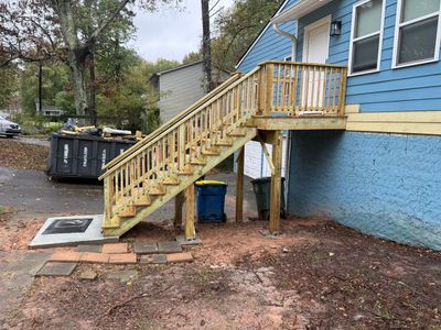 Custom Pressure-Treated Wood Staircase and Landing Installation