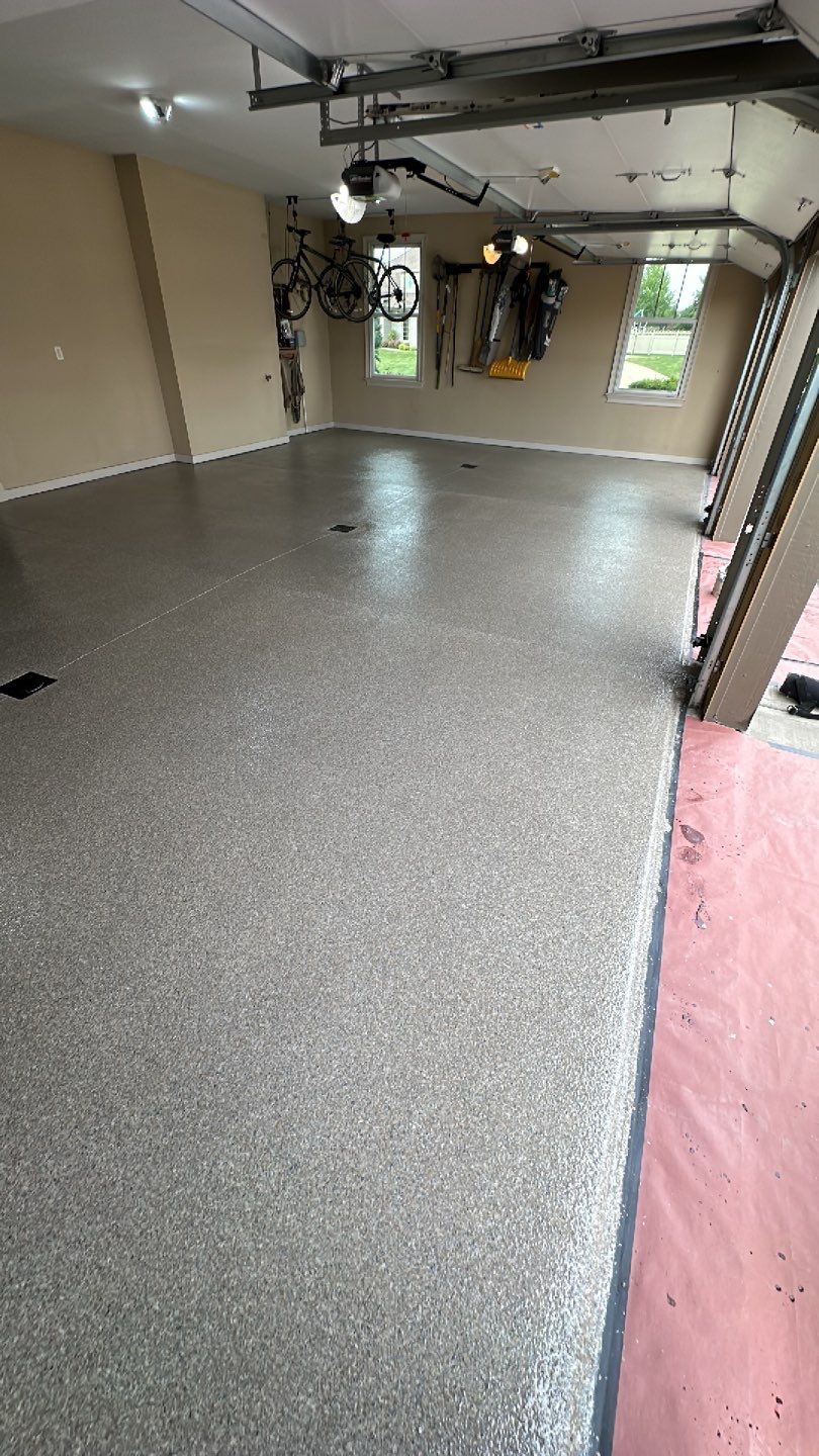 Large Patio + Garage Project in Moon Township by Floors in a Day, Inc