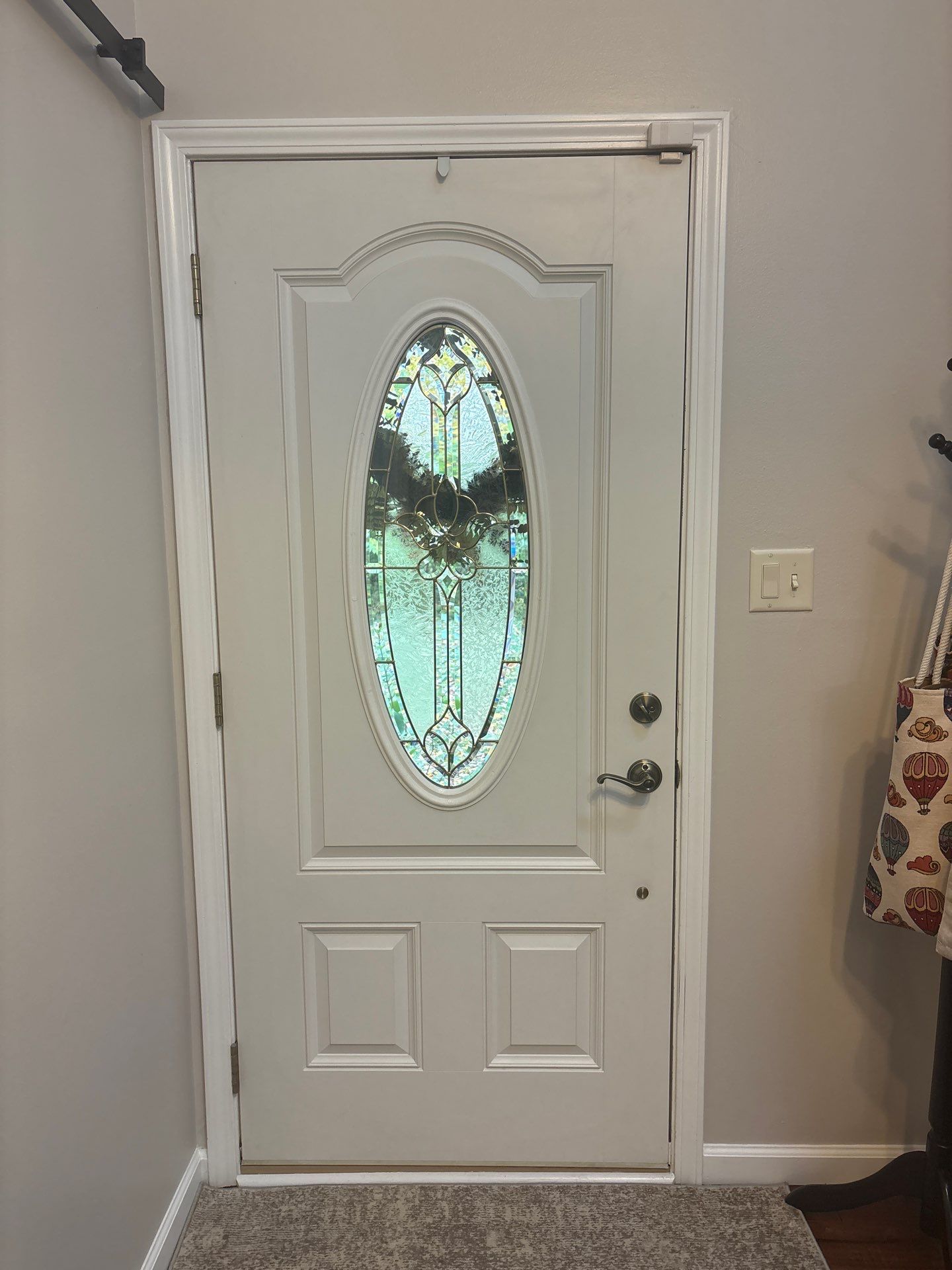 Modern Black Front Door Installation in Greenwood by Merrifield Exteriors, LLC