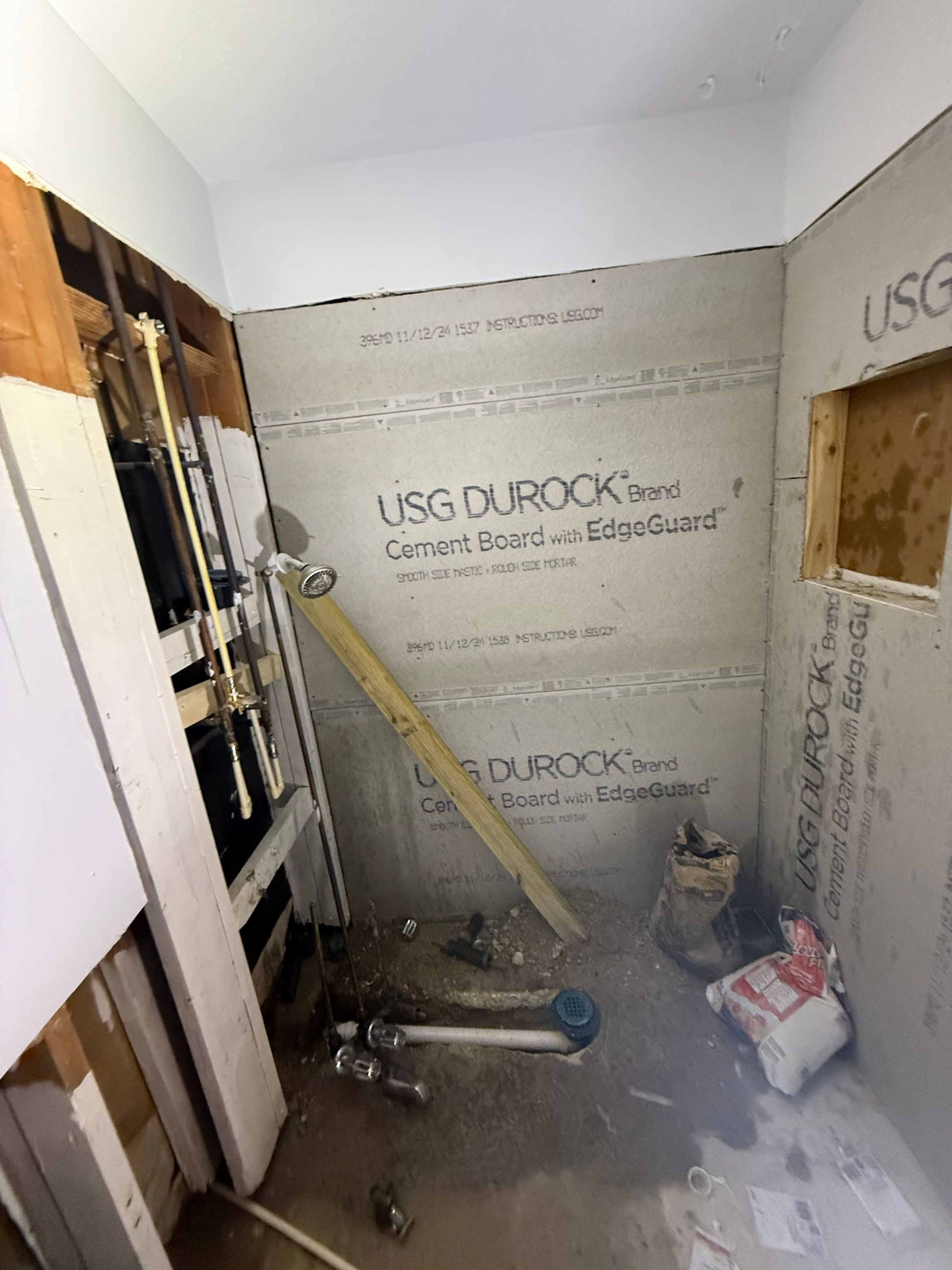 Dual Bathroom Makeover by urban green energy llc